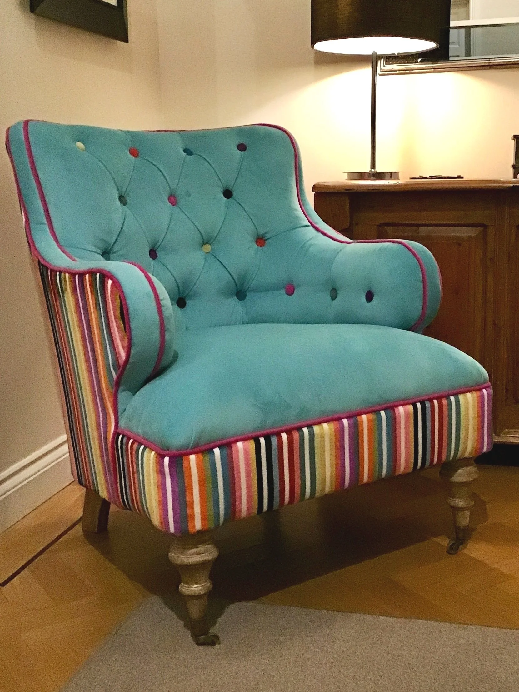 button backed armchair