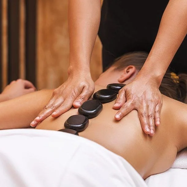 Hot stone massage therapy at Panda Revival Lab in Surrey