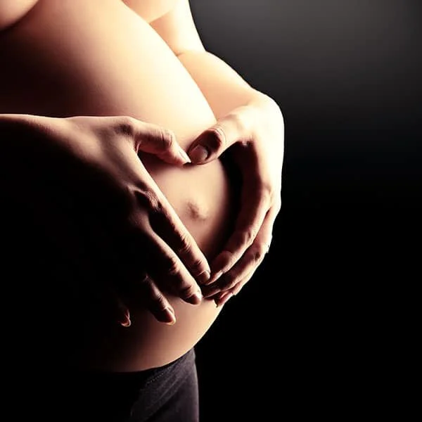 Pregnancy massage to ease back and hip discomfort at Panda Revival Lab in Surrey