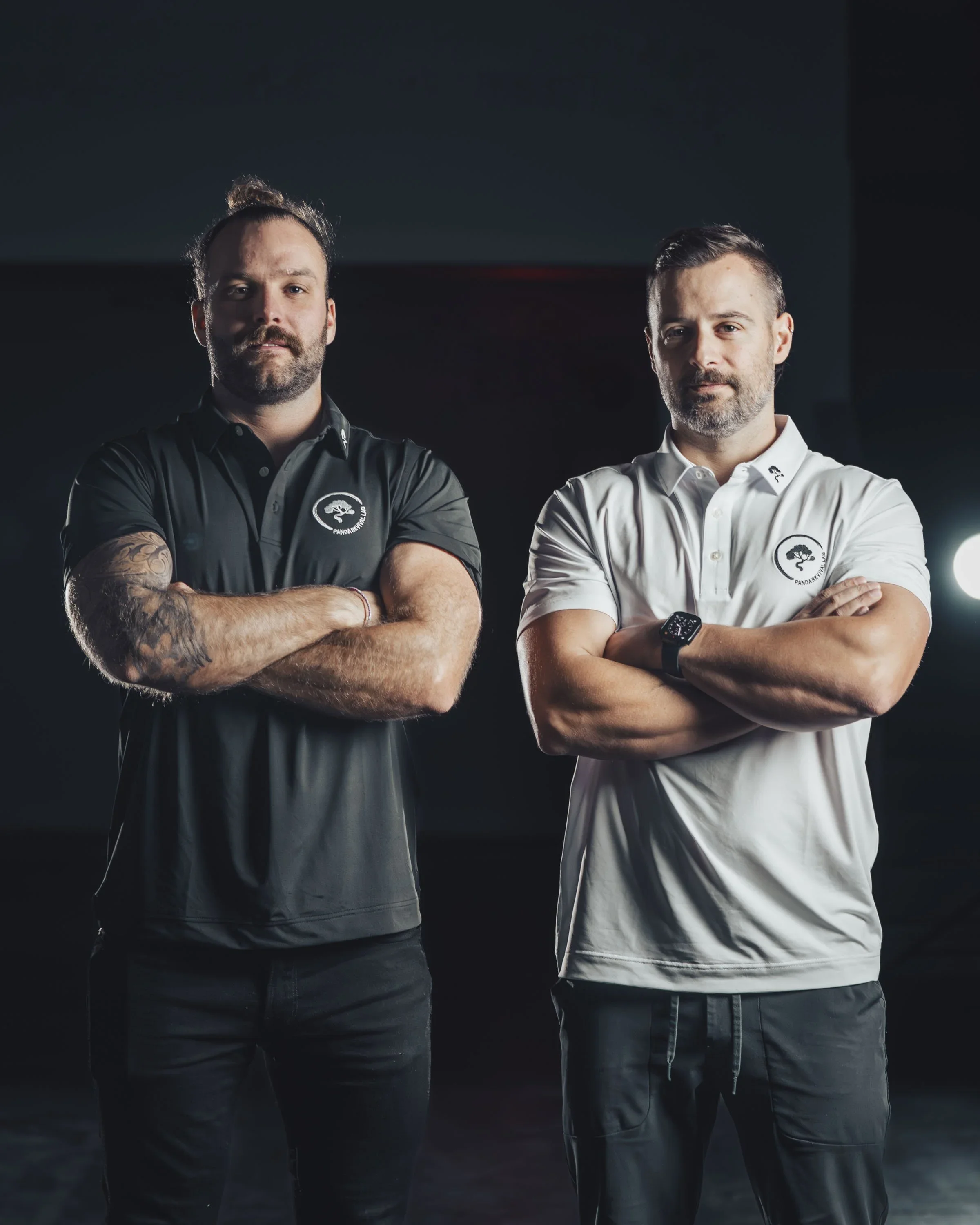 Joe Ward and Adam Tulk, co-founders of Panda Revival Lab in Surrey, standing with arms crossed