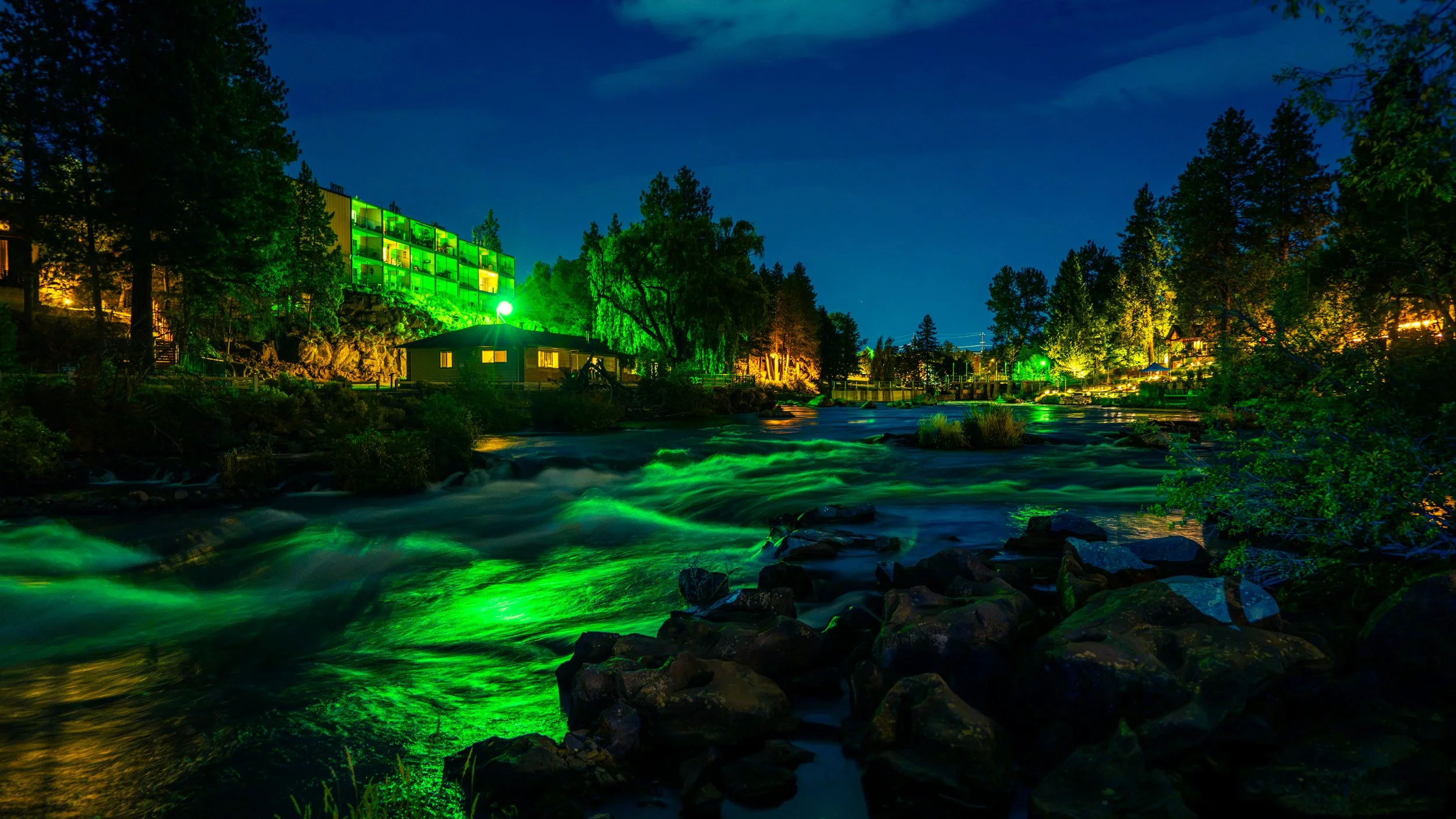 First Street Rapids and evening lights at night in Bend, Oregon