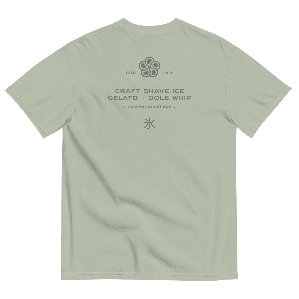 The back of a sage green t-shirt with the HulaScoops flower mark above the text “Craft Shave Ice, Gelato and Dole Whip” and the Japanese symbol for kakigori all printed in a darker green color.