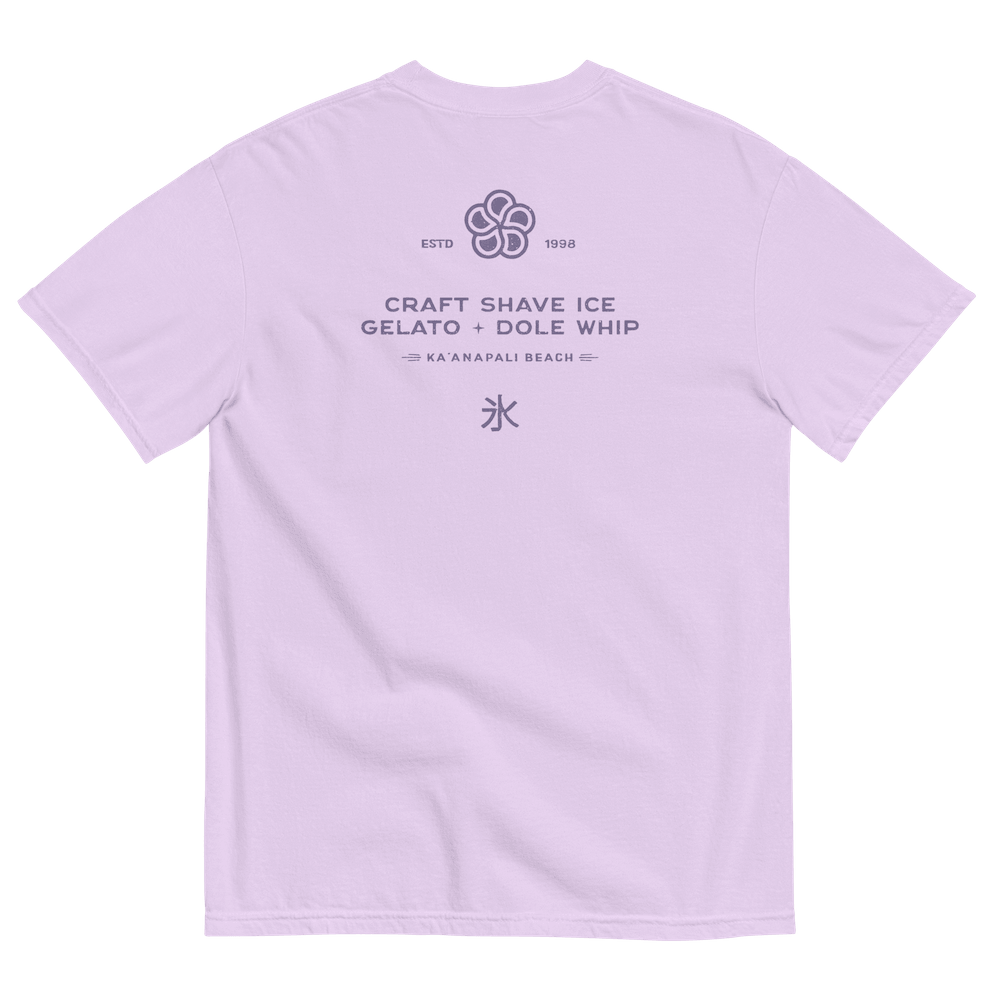 The back of a pale lavender t-shirt with the HulaScoops flower mark above the text “Craft Shave Ice, Gelato and Dole Whip” and the Japanese symbol for kakigori all printed in a darker purple color.