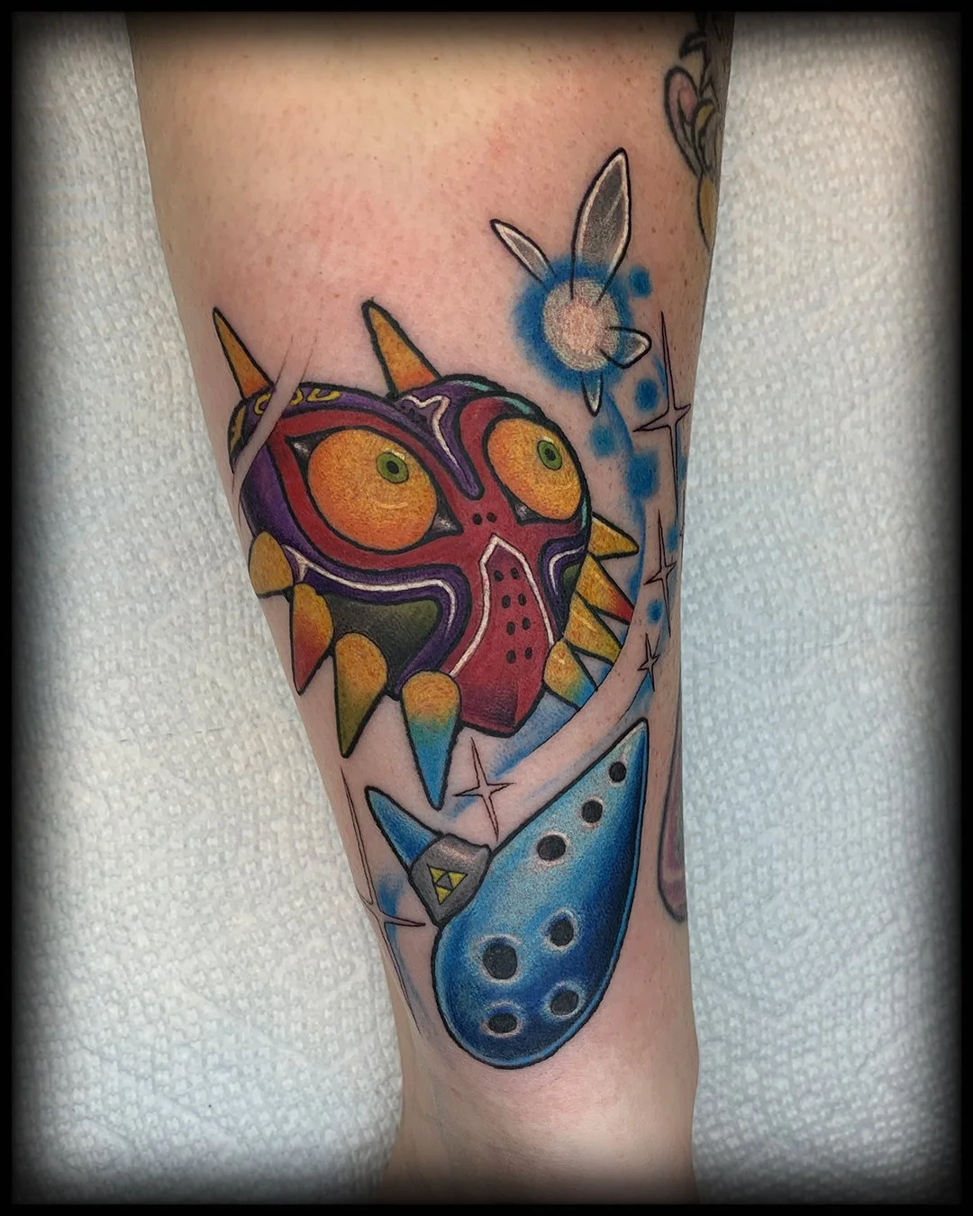 video-game-zelda-majoras-mask-ocarina-navi-tattoo-aaron-new-leaf.jpg