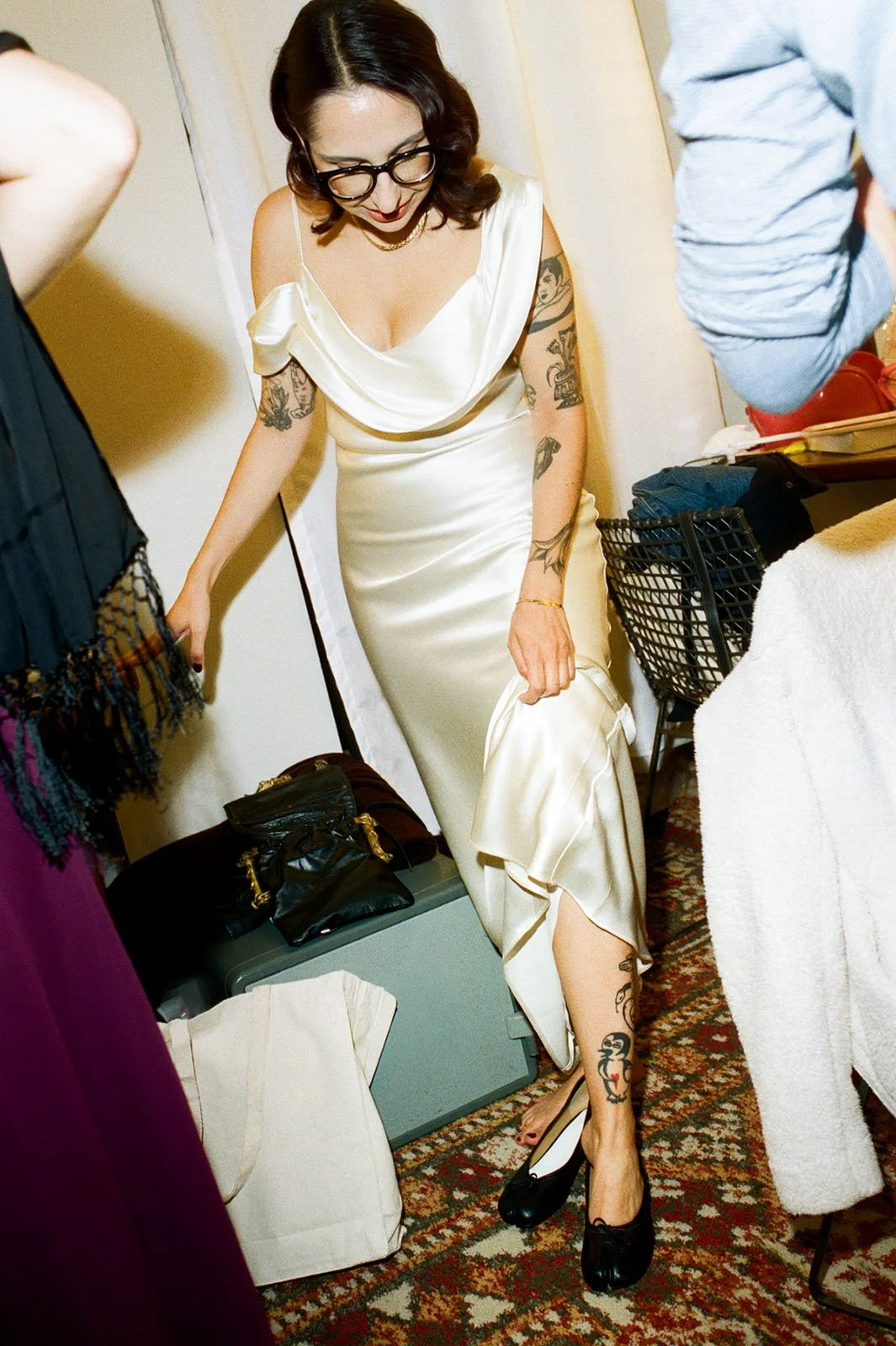 Gem-Theater-Wedding-Bride-Putting-Shoes-On.jpg