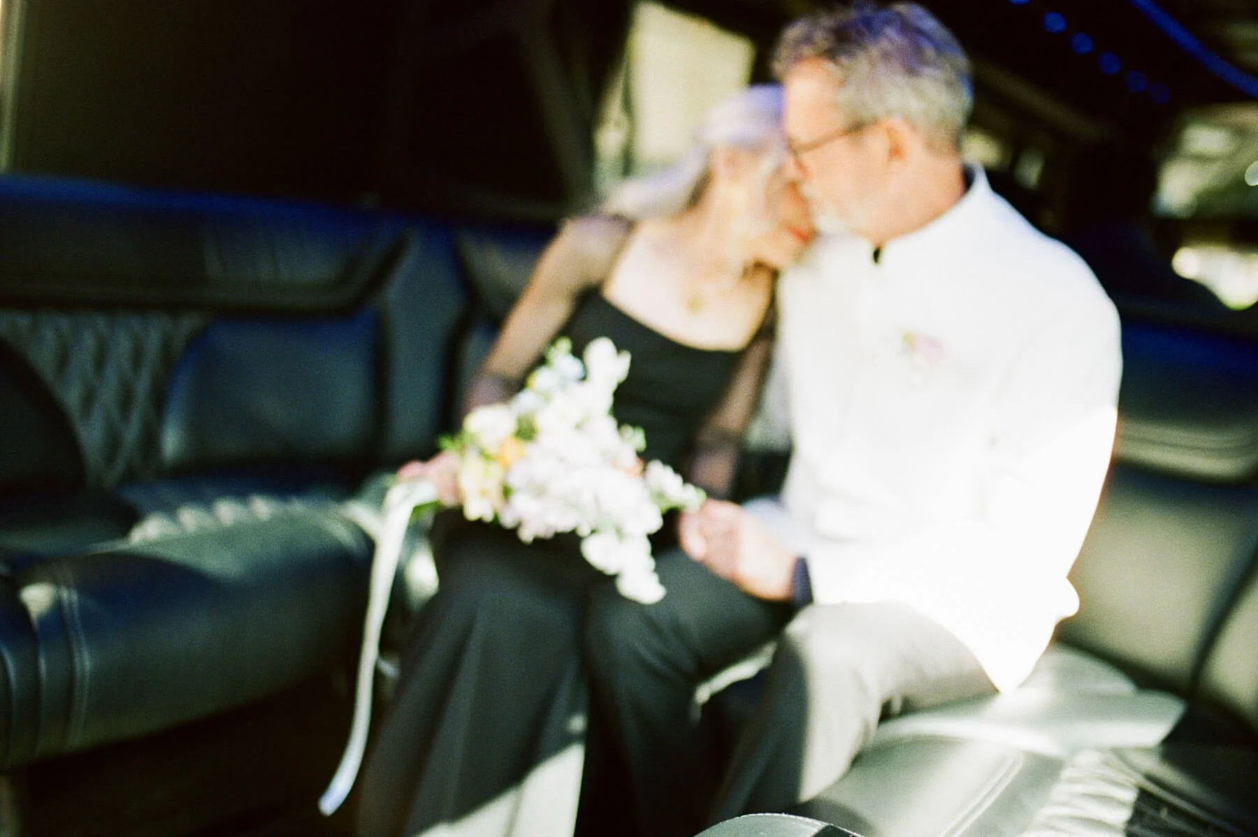 UMMA-Wedding-Candid-in-Car.jpg