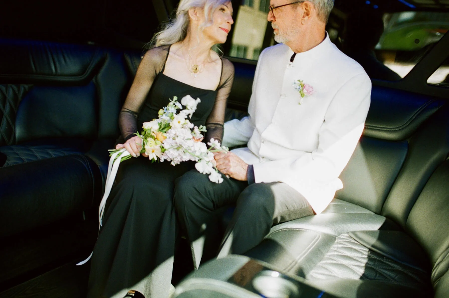UMMA-Wedding-Couple-in-Car.jpg