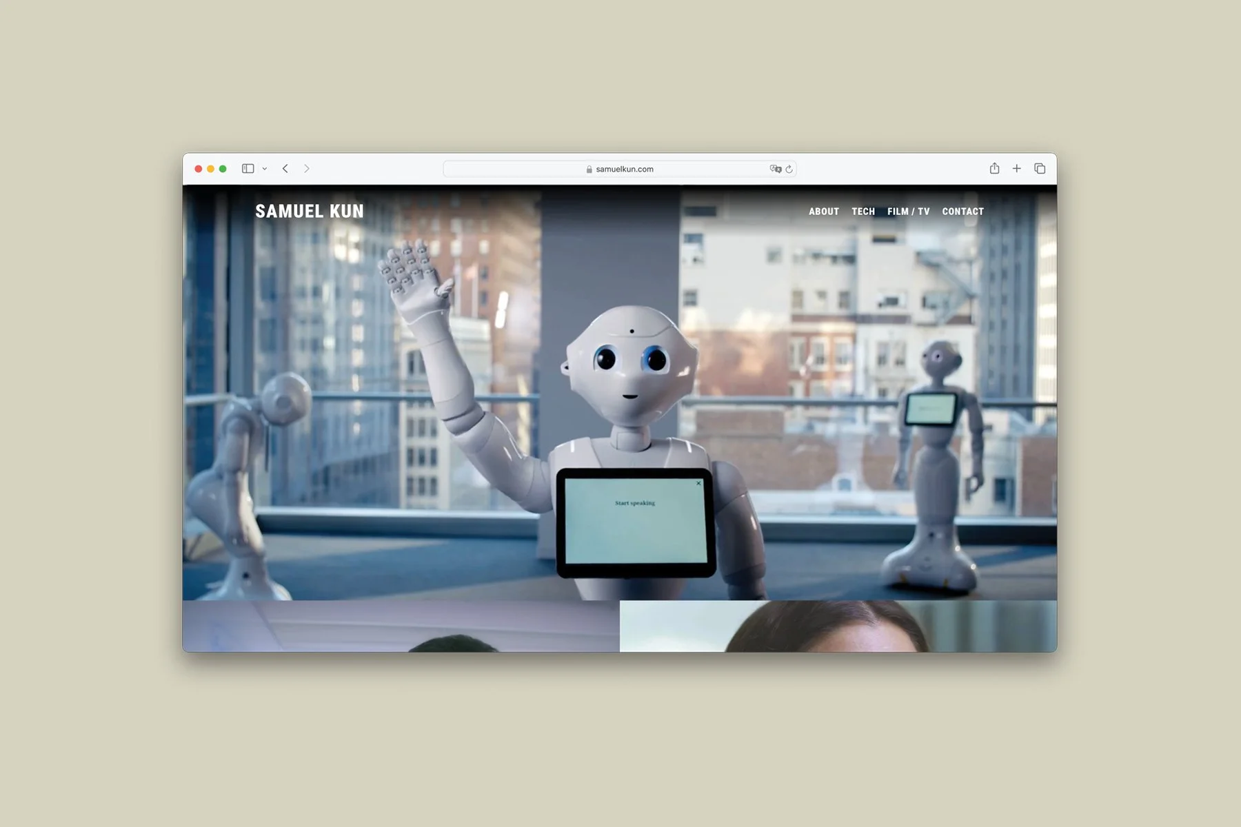 A webpage with robotic robots on a city balcony with a view of tall buildings, one robot waving and another with a screen on its chest.