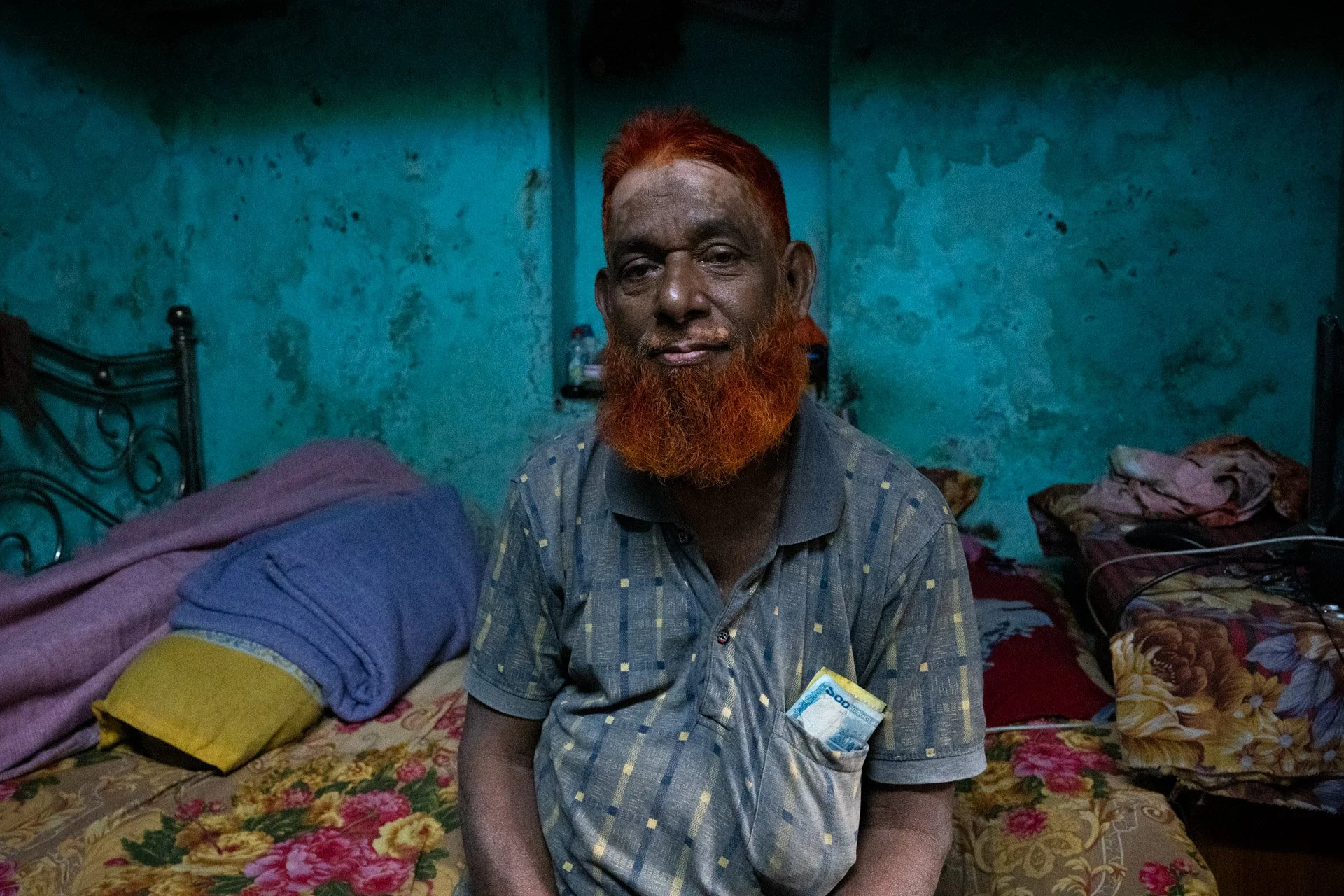 A gentleman in old Dhaka who invited us into his modest home