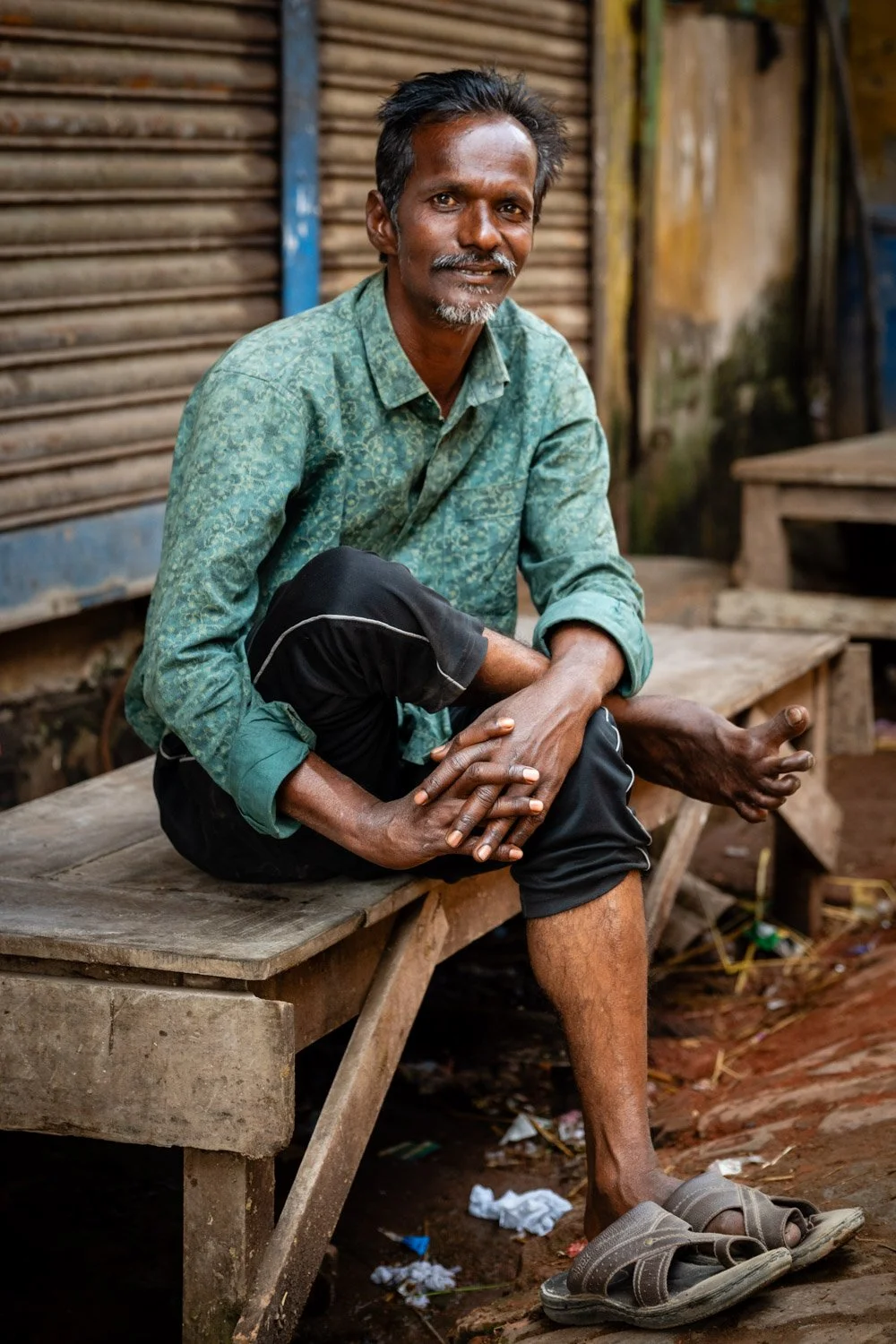 He had a damaged foot and agreed to pose for me in a small village in Dhaka. 