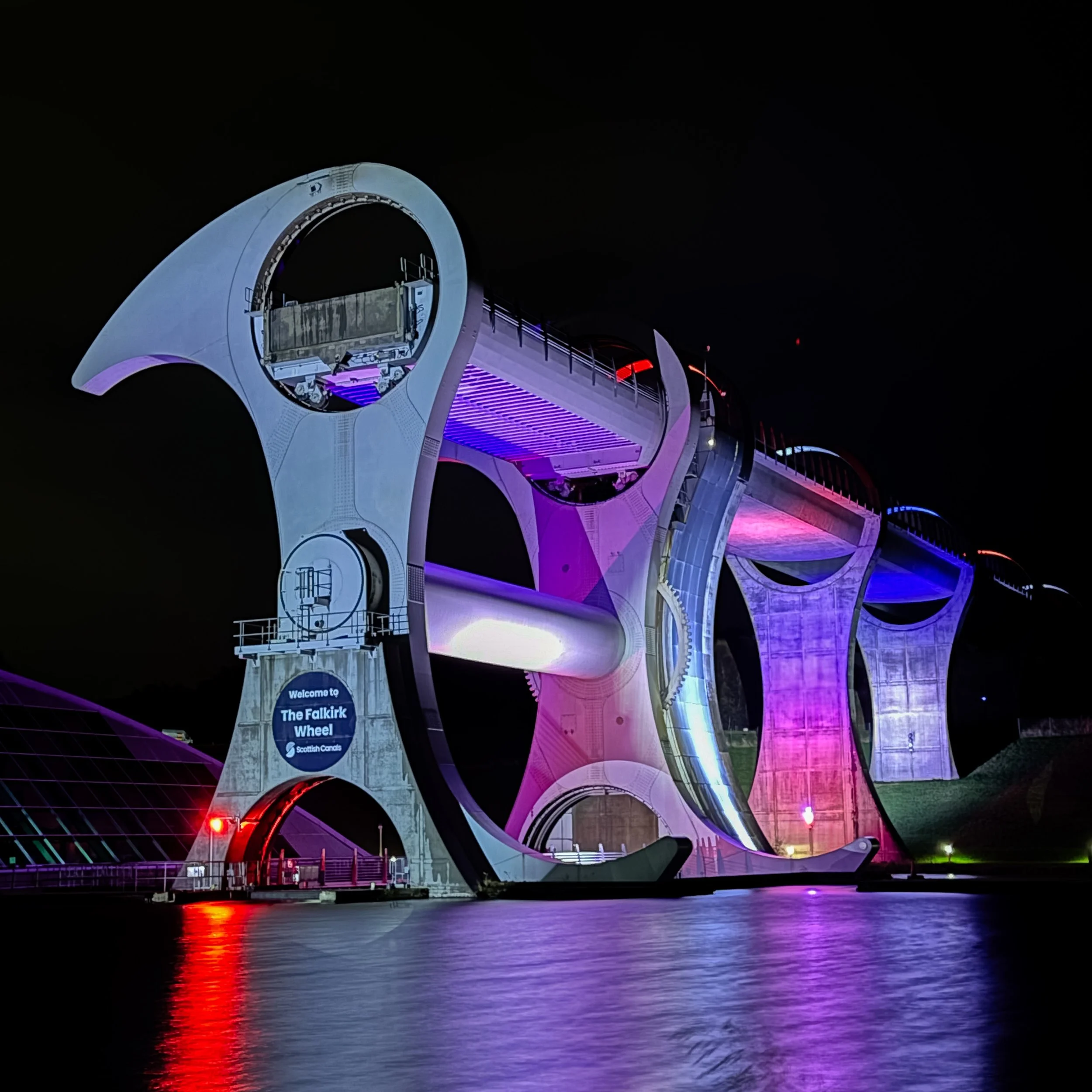 The Falkirk Wheel illuminated at night