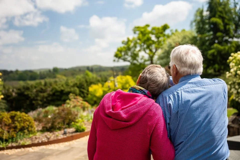 Venelle summer couple looking at view