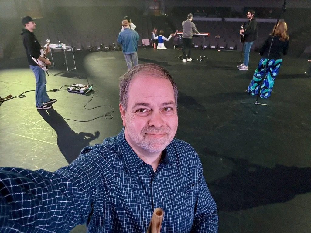 James Knabe offstage sounding the shofar the trunmpet of the bible in Dallas, TX