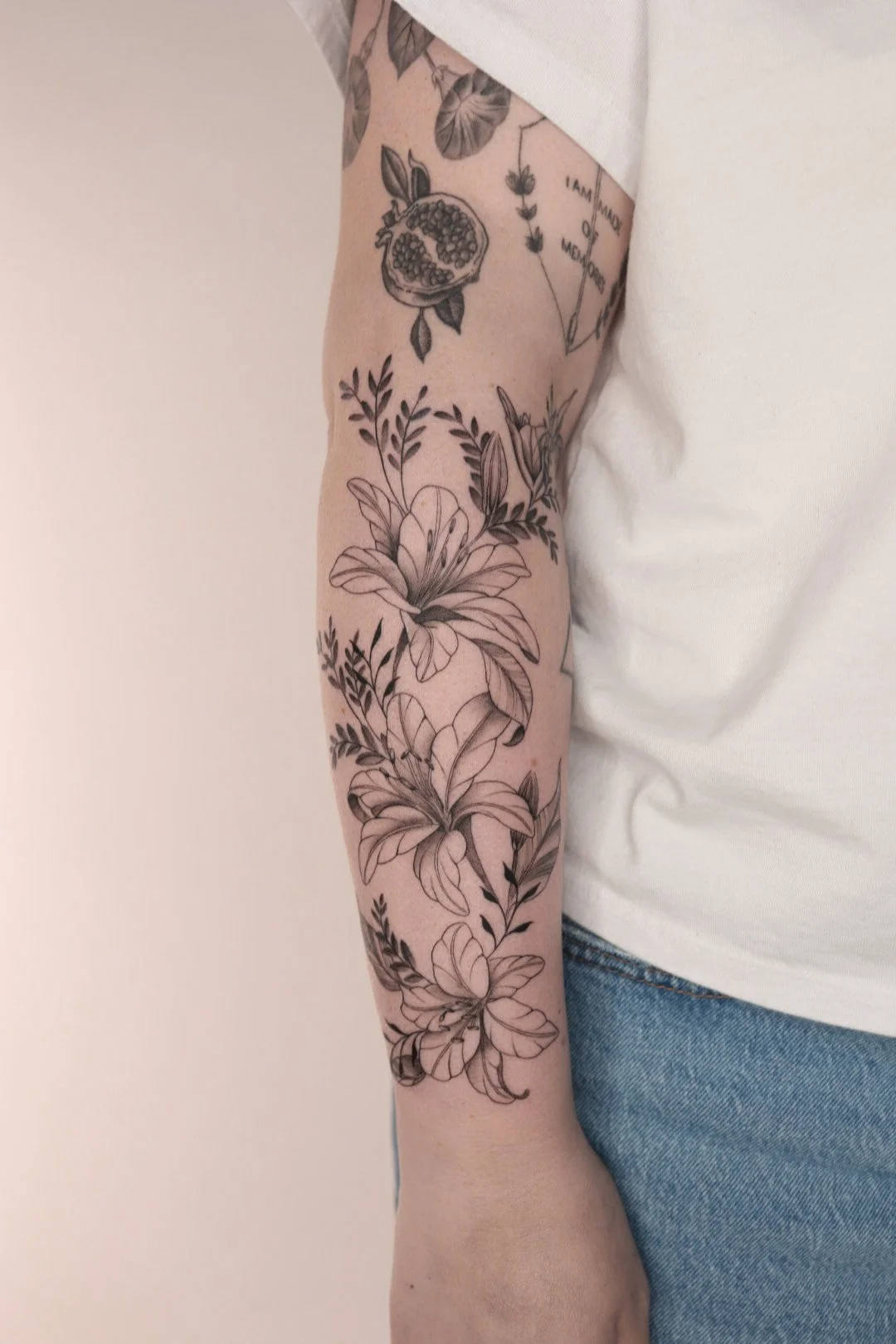 floral forearm tattoo