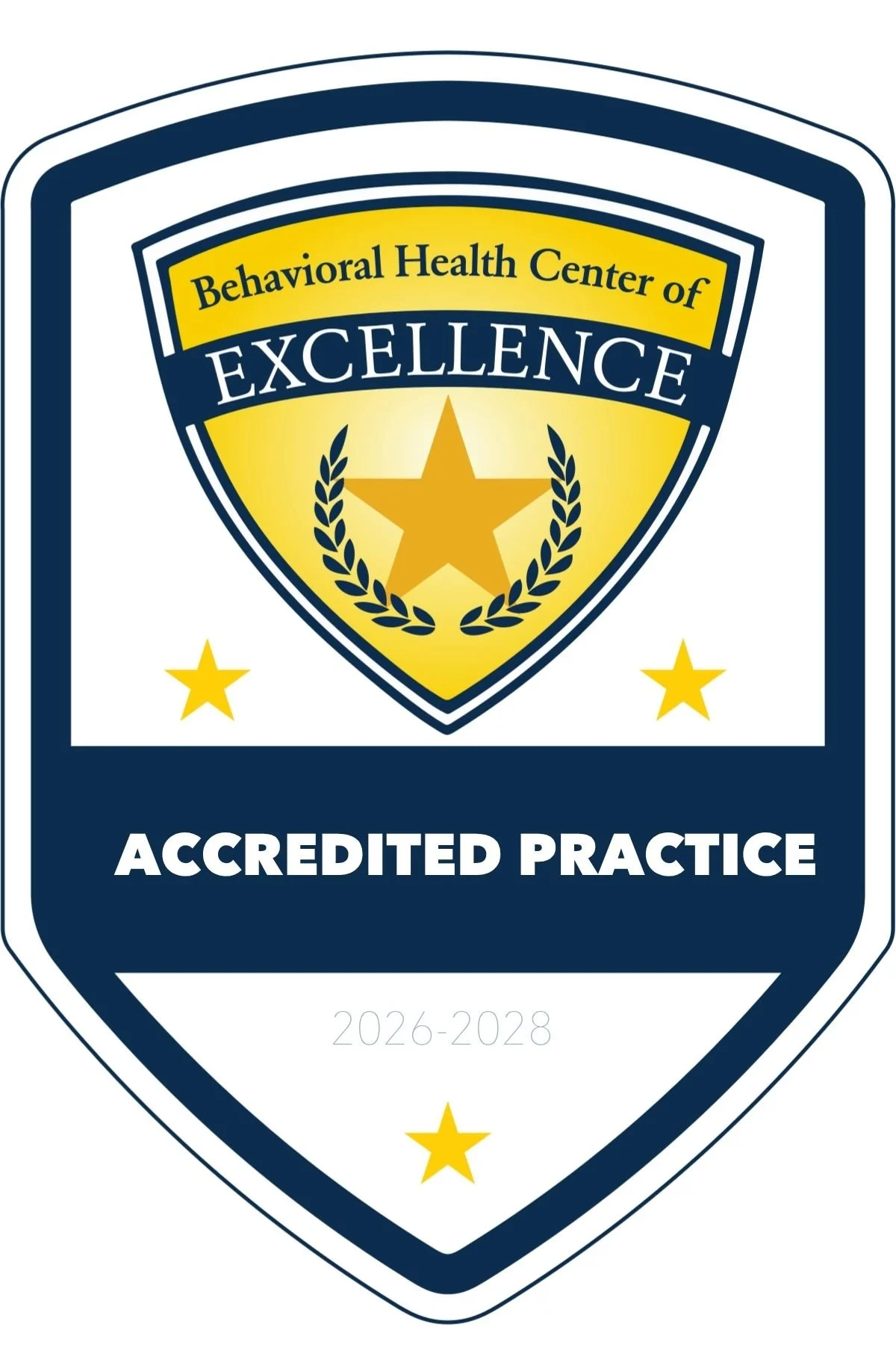 Badge with a shield shape, displaying the words 'Behavioral Health Center of Excellence' in a yellow banner and a large gold star with laurel leaves, and the words 'Accredited Practice' at the bottom, with the years 2026-2028.