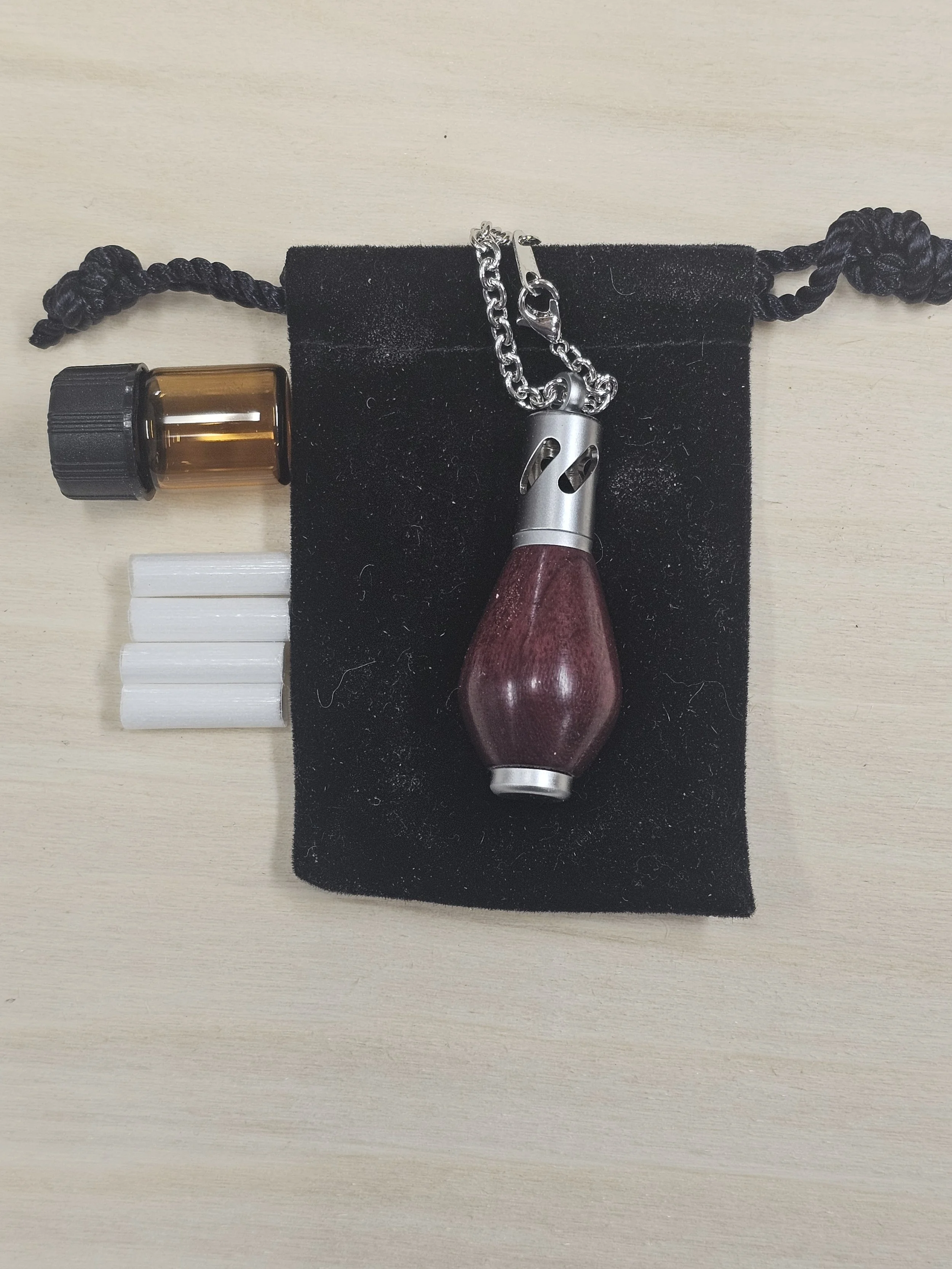 Aroma Therapy Oil Diffuser Pendant made of purpleheart wood teardrop shaped