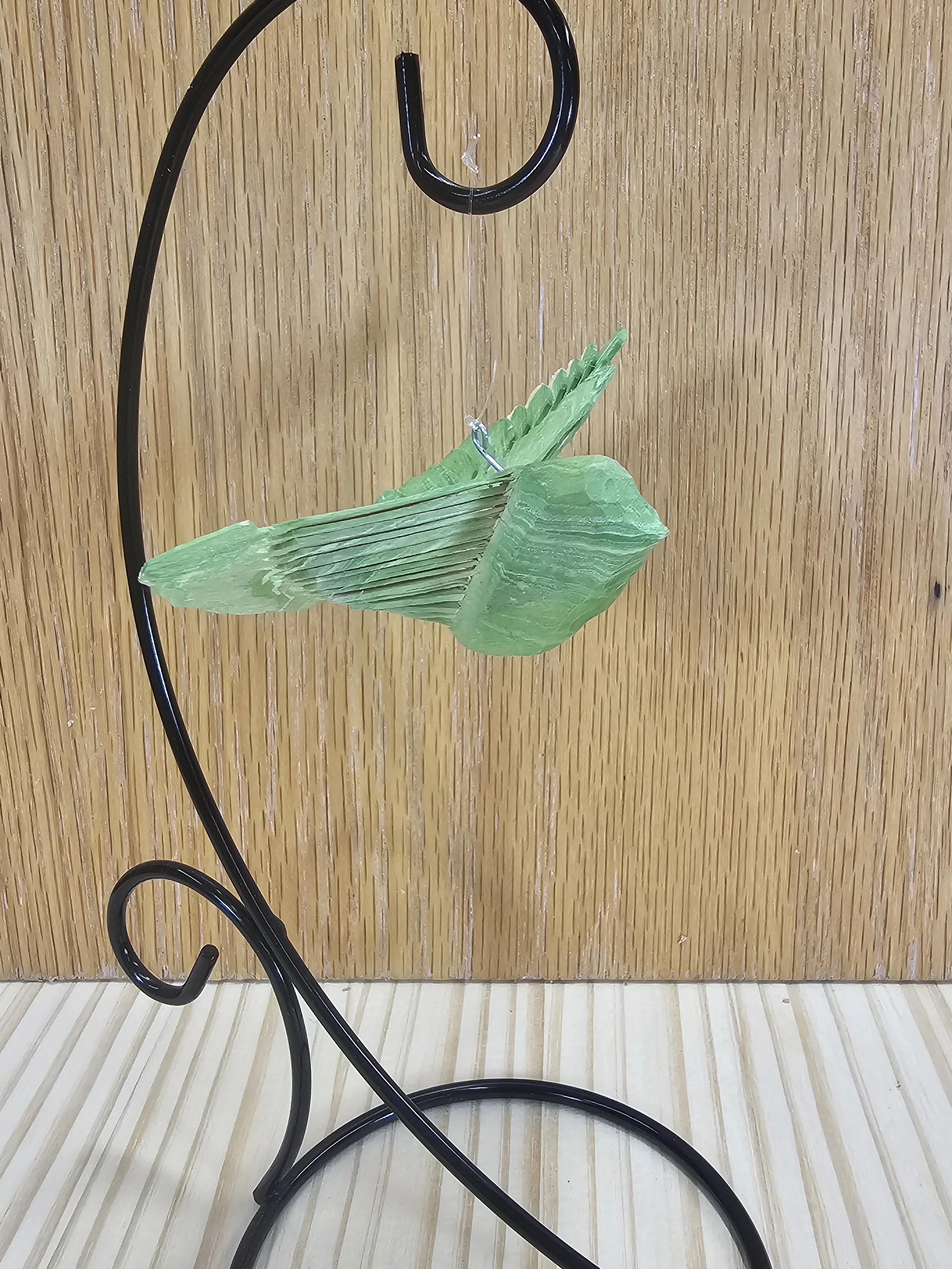 Green water marbled medium sized fan bird with stand