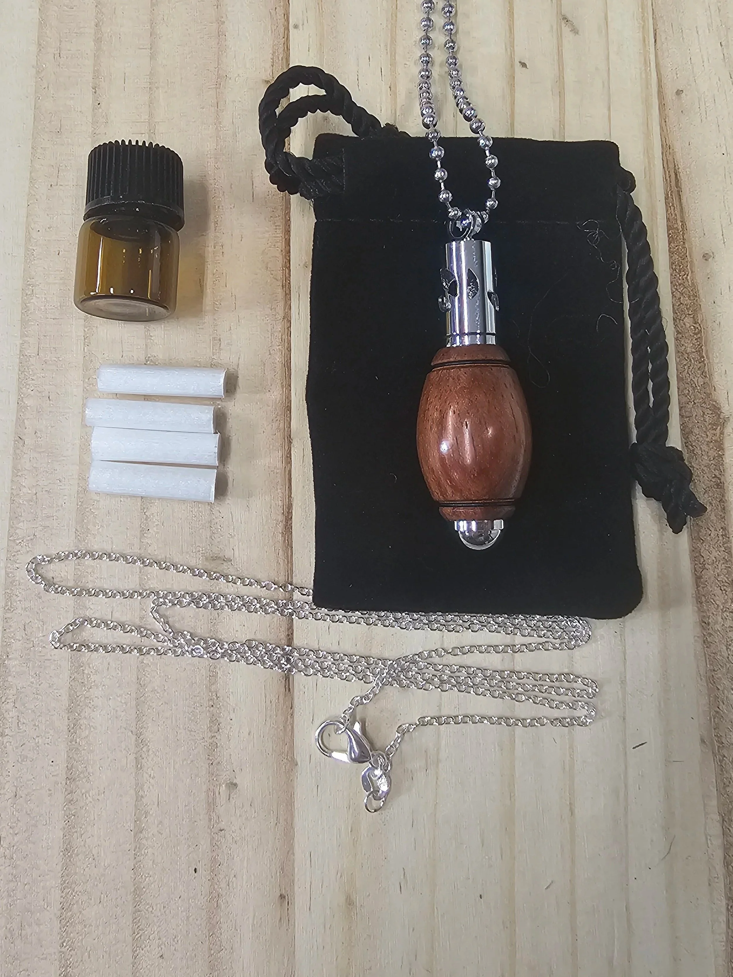 Aroma Therapy Oil Diffuser Pendant made of mahogany football shaped