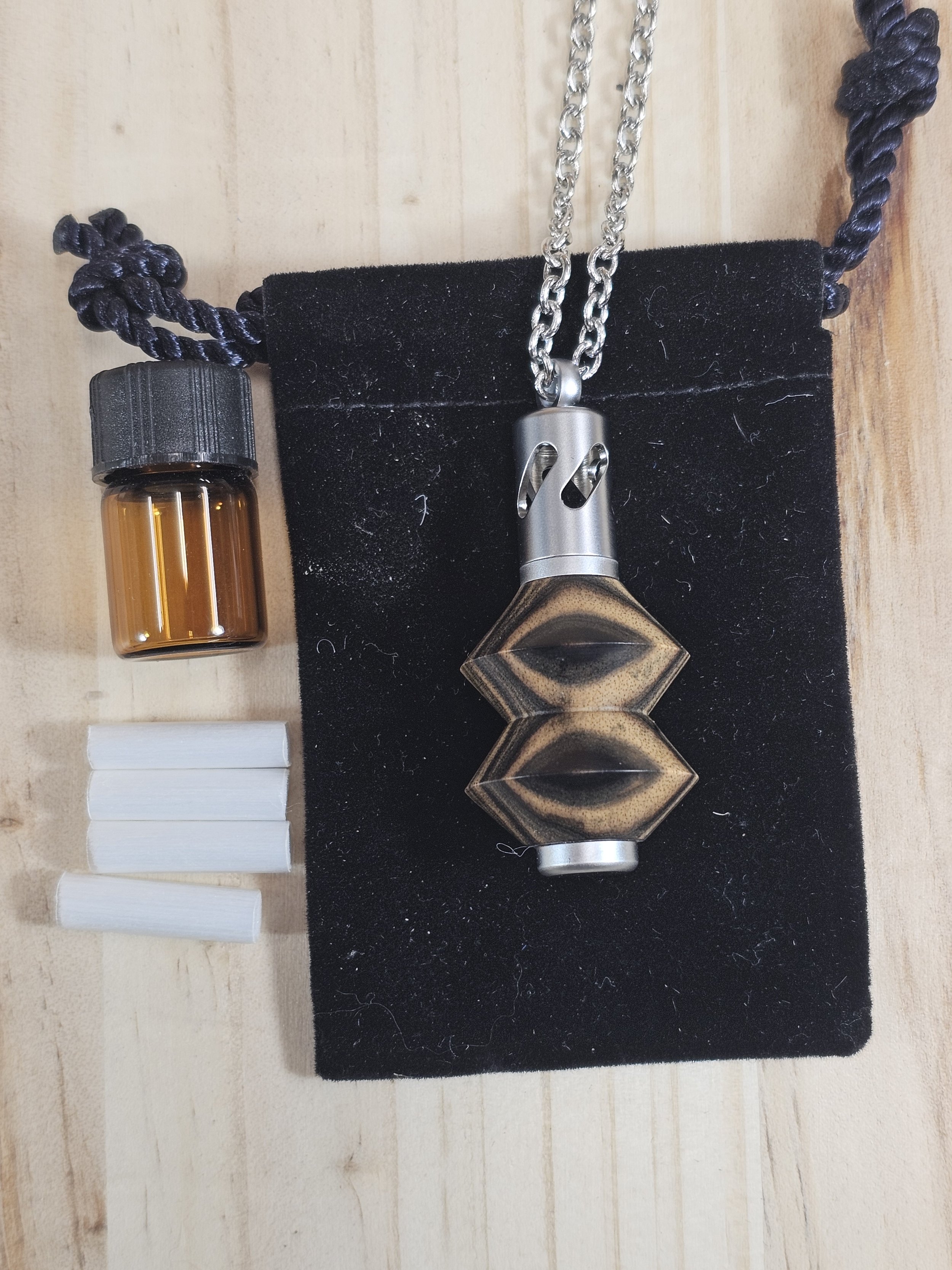 Aroma Therapy Oil Diffuser Pendant made of black & white ebony