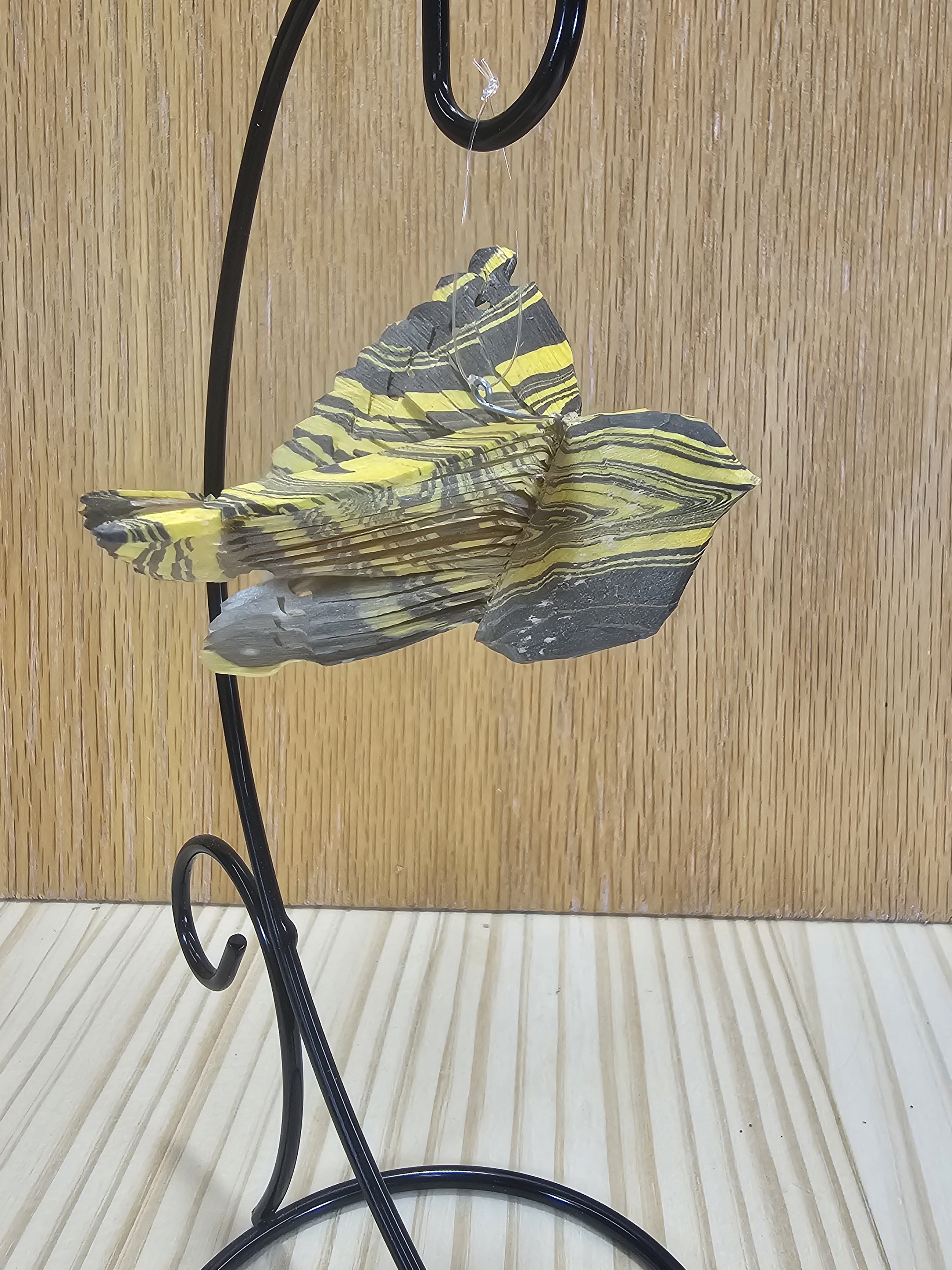 Black & Gold water marbled medium sized fan bird with stand