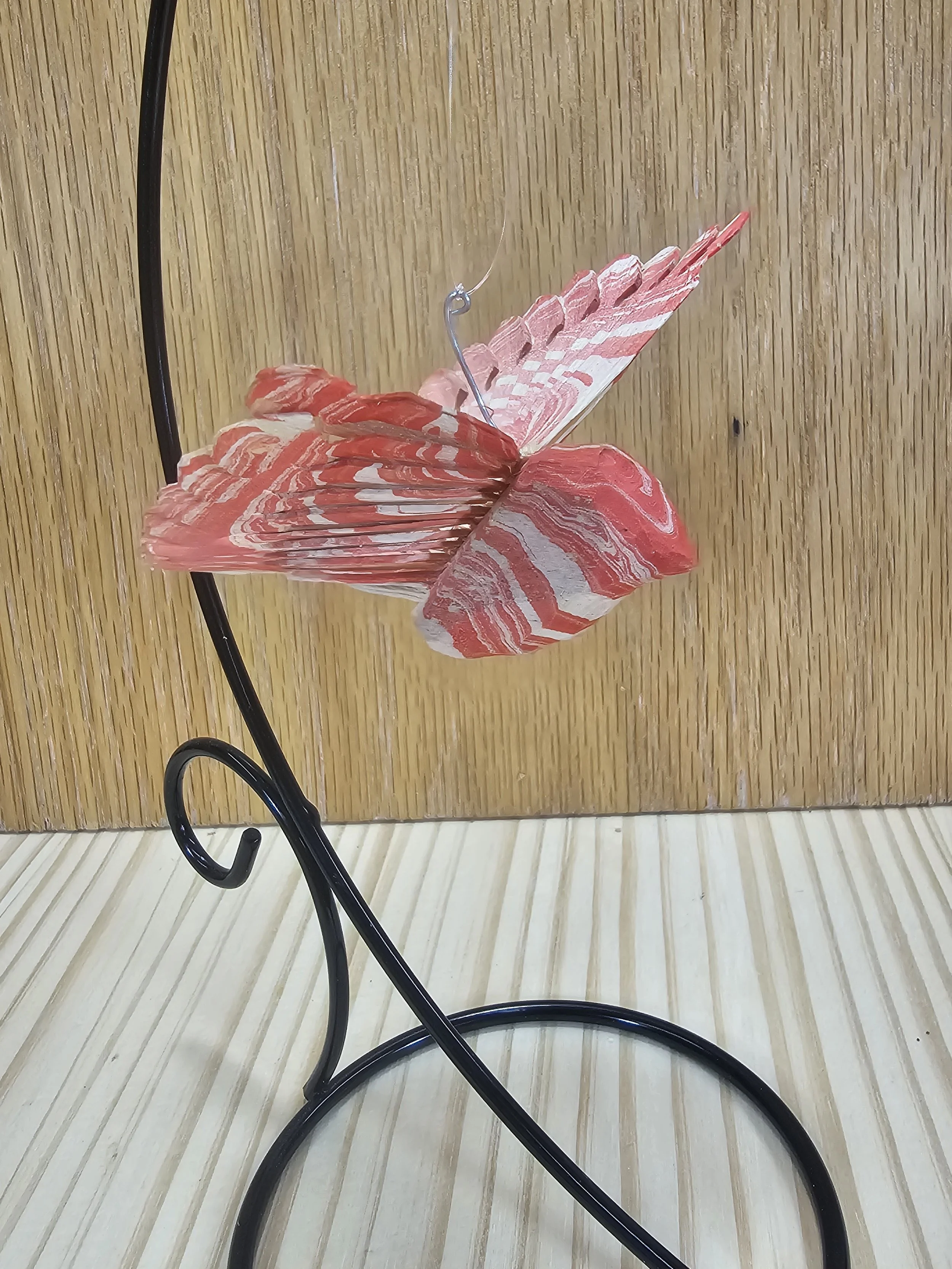 Red & White water marbled medium sized fan bird with stand