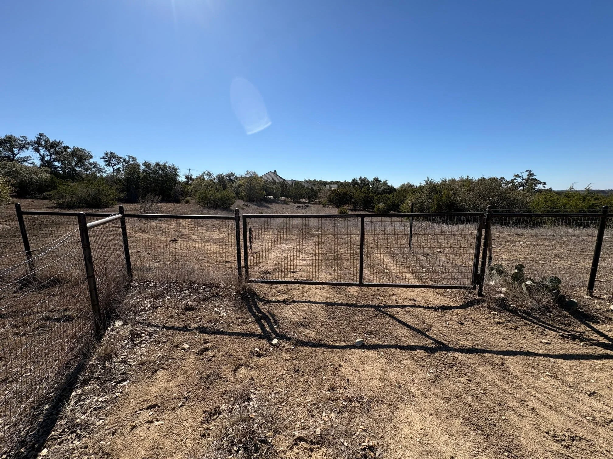 Gate to additional 4.8 acres and home if desired to purchase