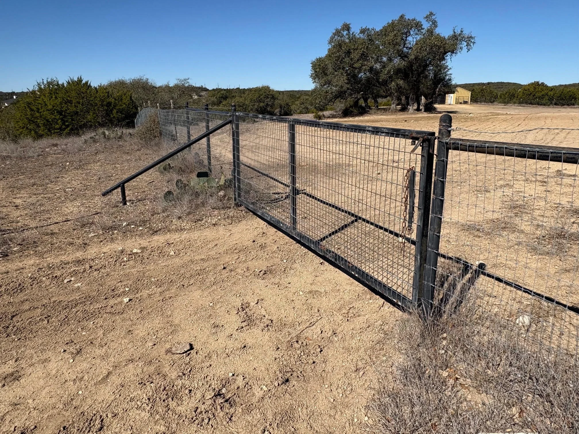 Gate to additional 4.8 acres and home if desired to purchase