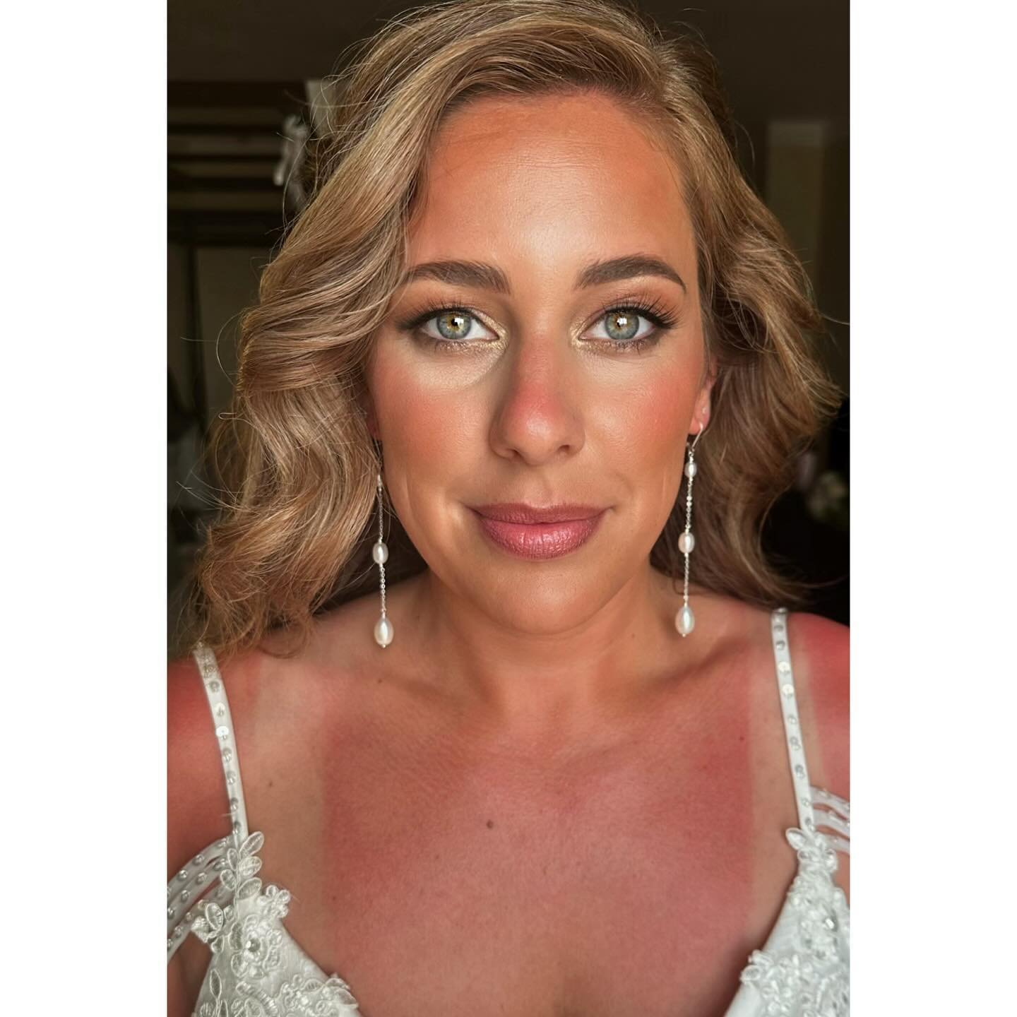 This gorgeous bride got married yesterday and opted out of her bridal preview. So today she did a trash the dress shoot on the beach and I did her makeup and touched up her hair for beautiful sunset photos!

The sun got the best of her today, so to m