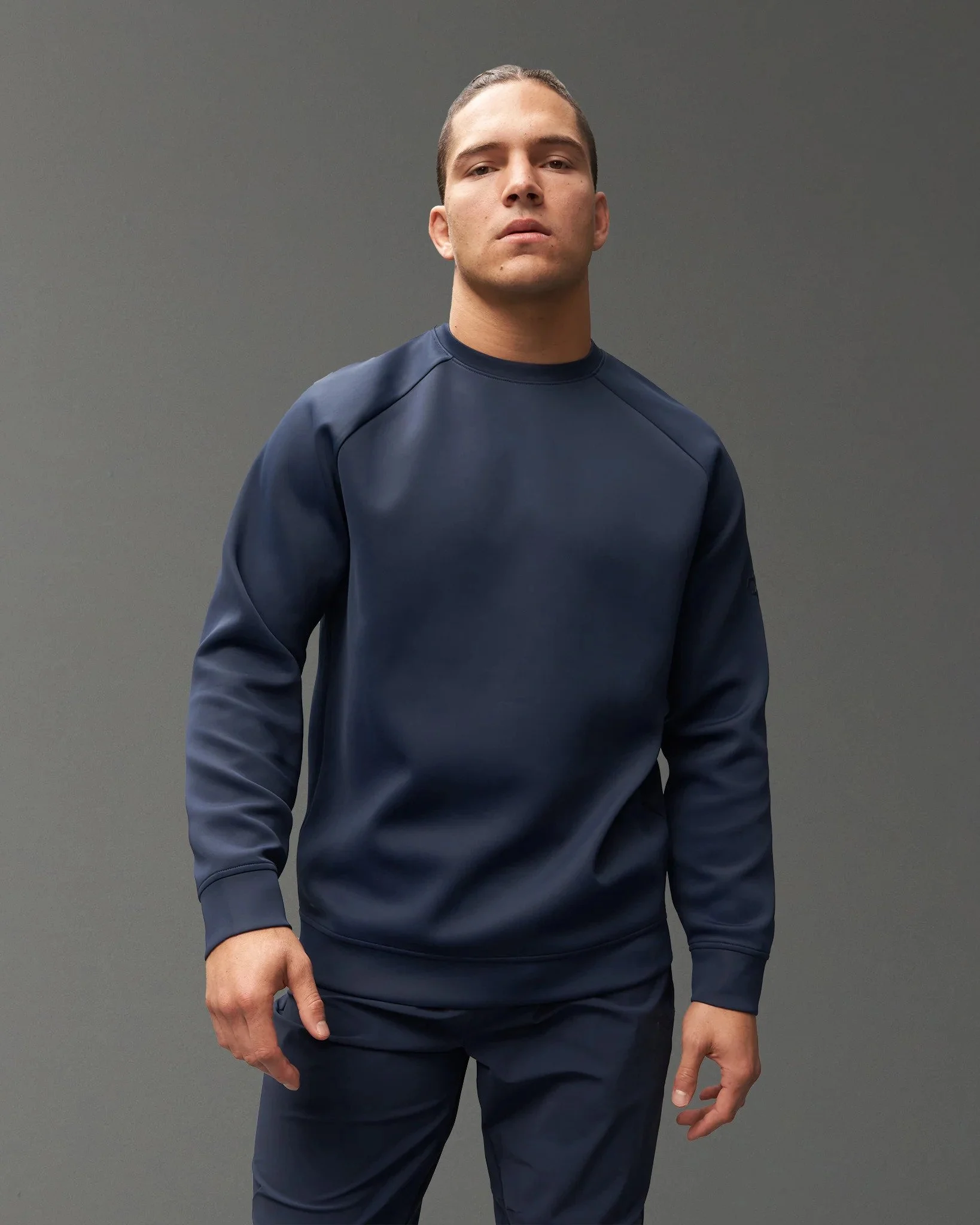 UNI-PO1176-CoolTouchCrewneck-FLT__Navy_0001_6ab36d01-641c-40a8-902d-fc24062fc2d4.jpg