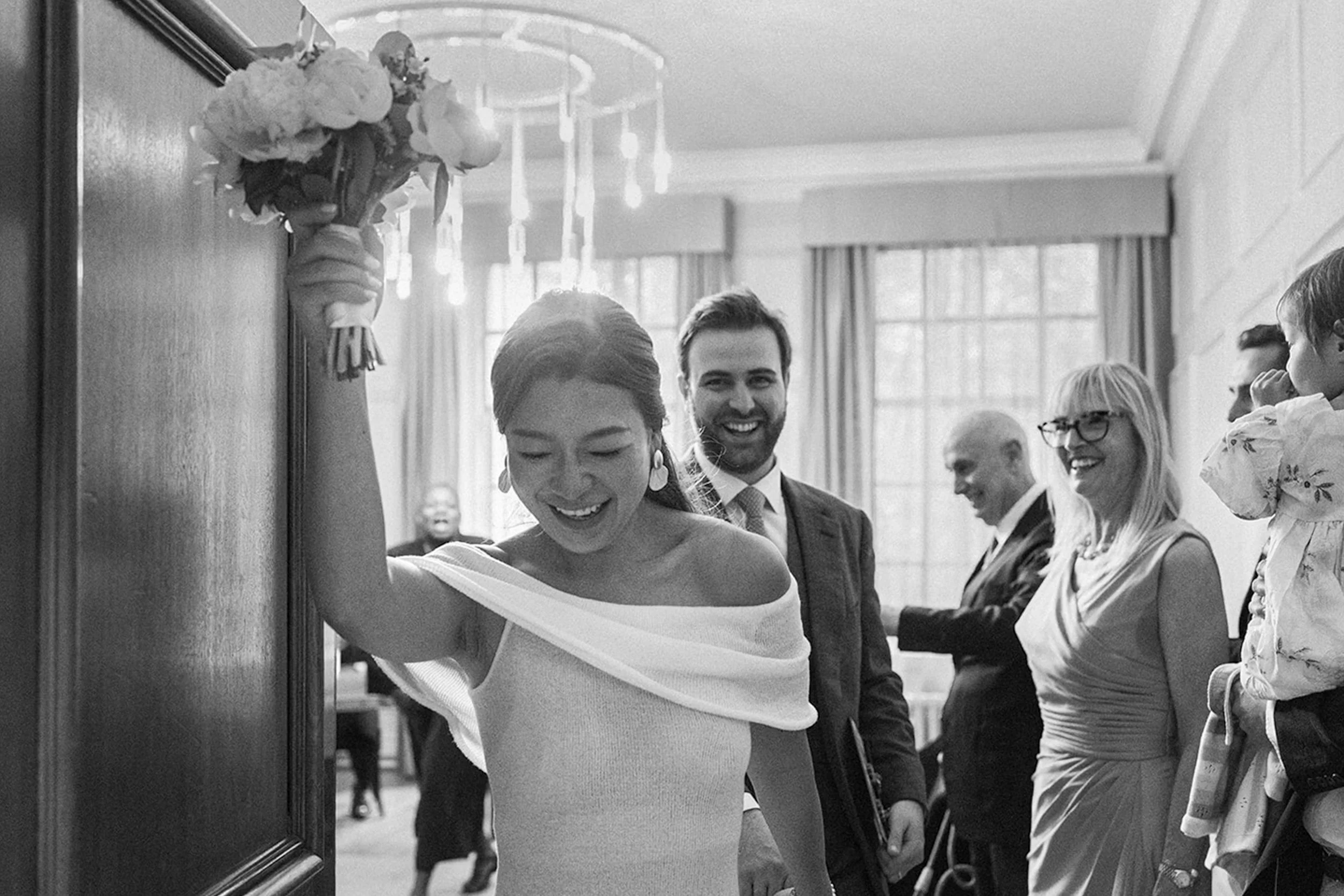 KaidiStefanodMaryleboneTownHallWeddingHappyExit.jpg