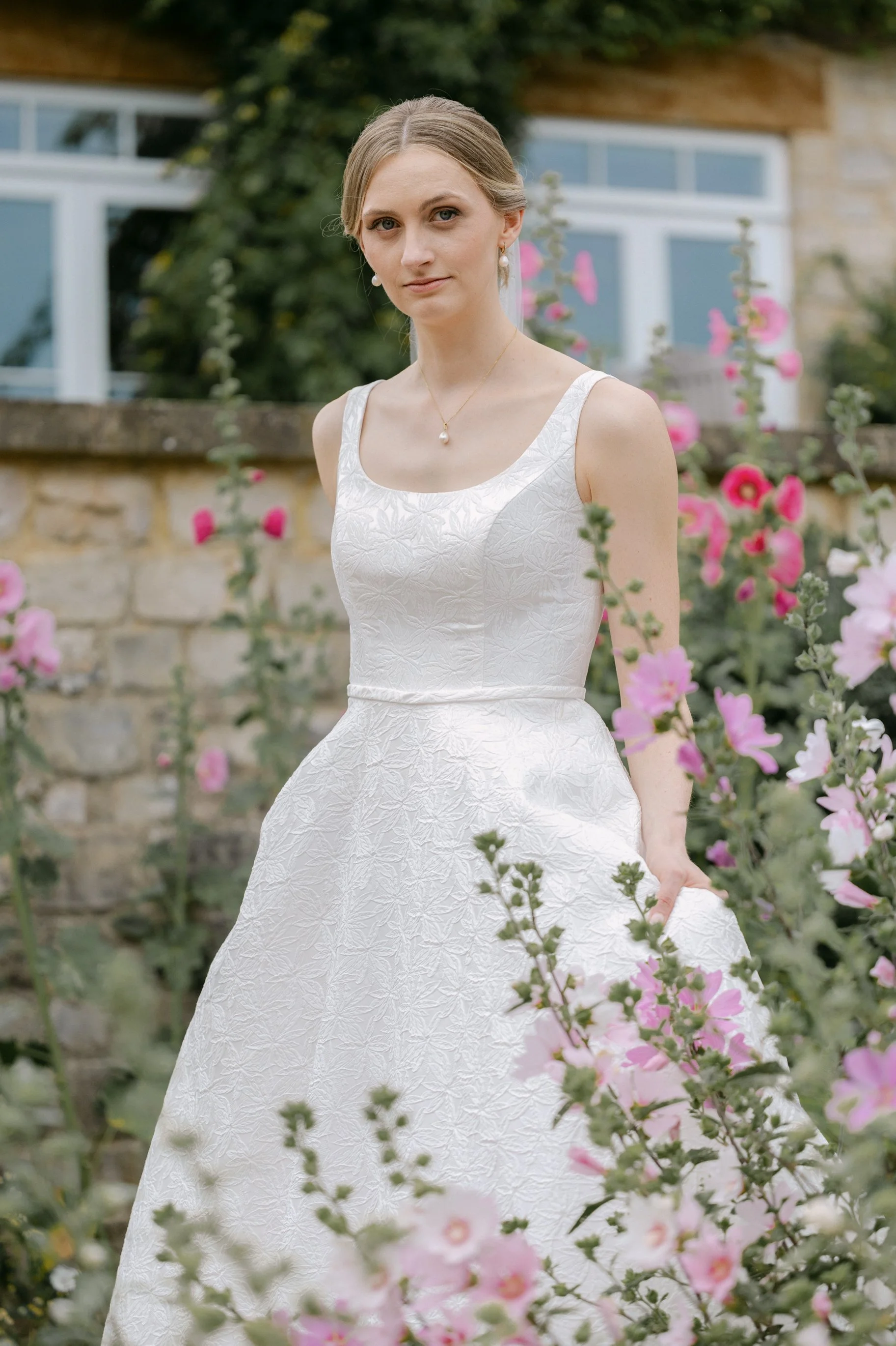 ChloeCaspianTrinityChurchLongbourneEstateWeddingChloeHollyhocks.jpg
