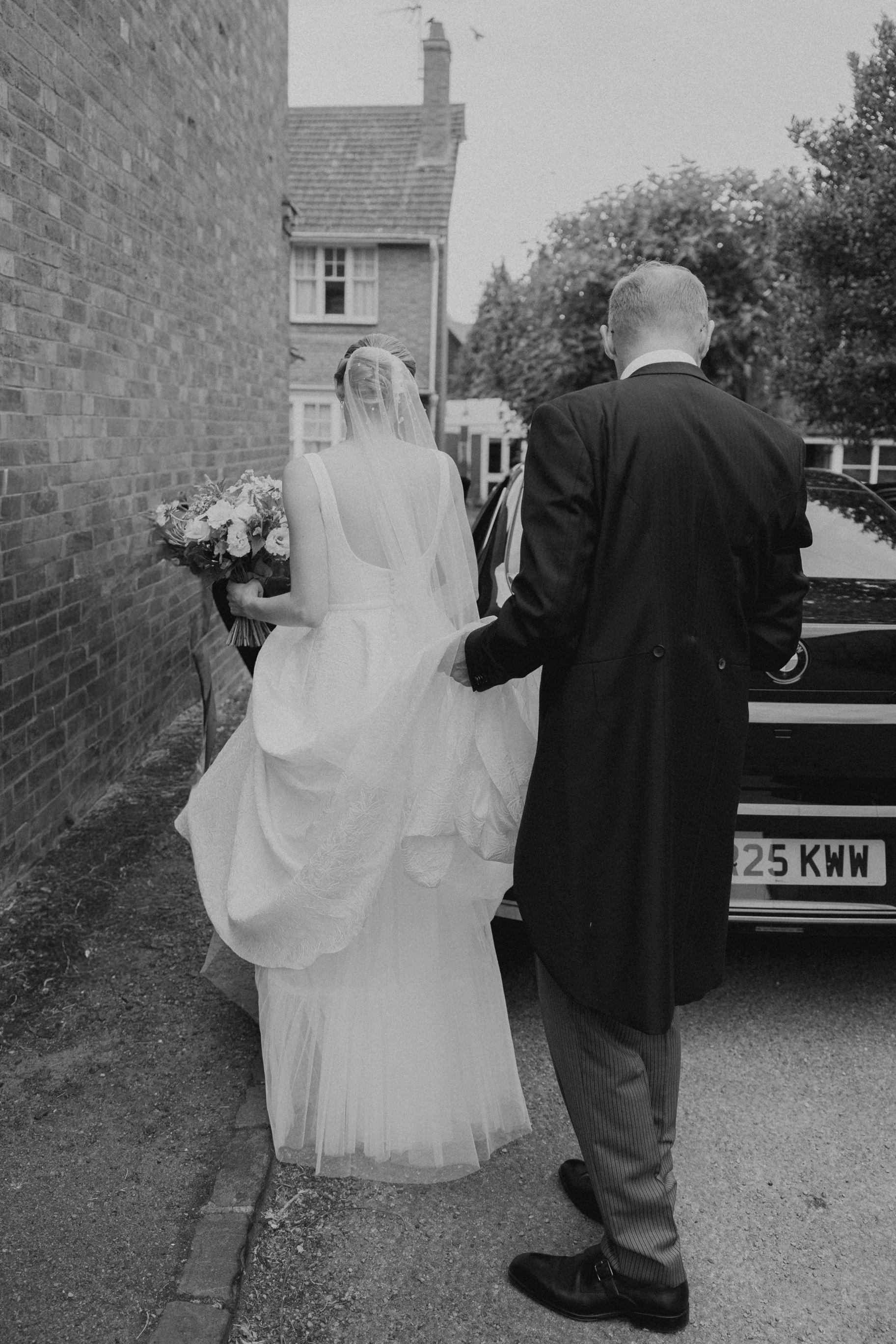 ChloeCaspianTrinityChurchLongbourneEstateWeddingCarDad.jpg
