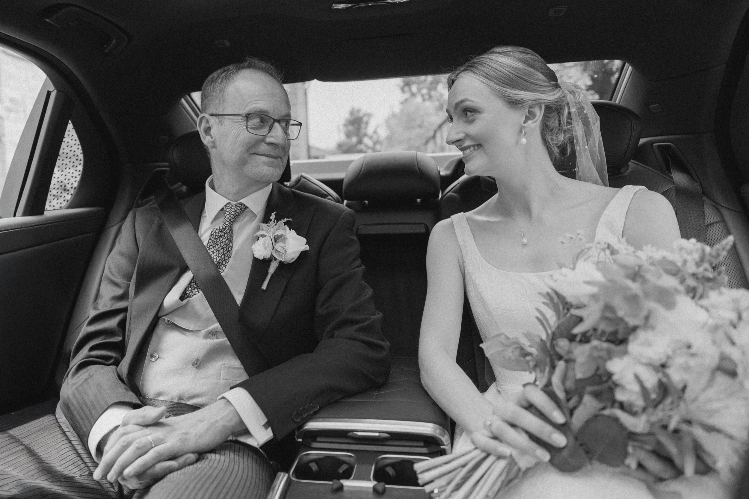 ChloeCaspianTrinityChurchLongbourneEstateWeddingInCarDadLook.jpg