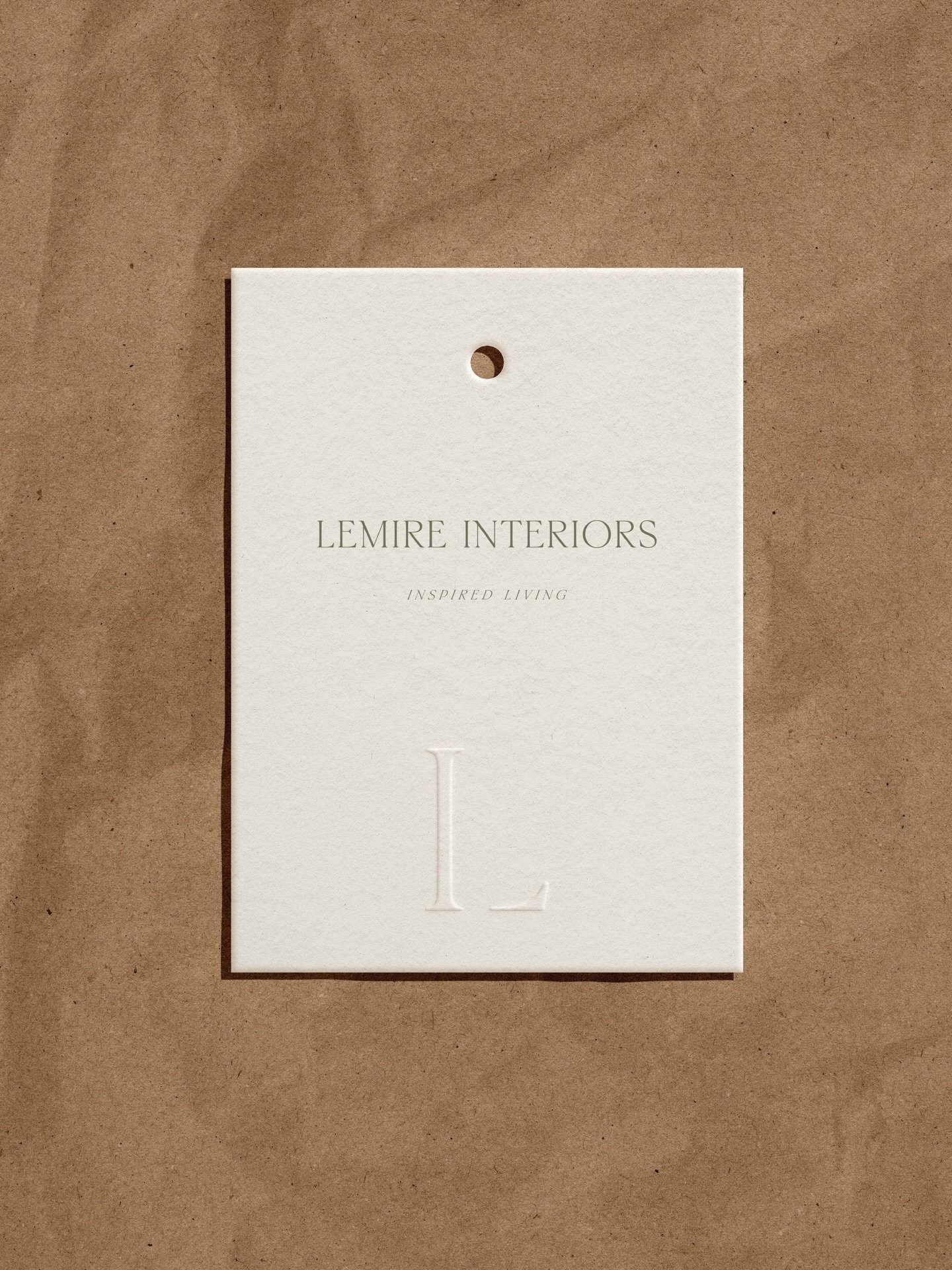 A mark that says more by saying less.

The Lemire Interiors monogram weaves letters L + I into a single, intentional form. Designed as a flexible system, it shifts effortlessly across every touchpoint while remaining in thoughtful conversation with A