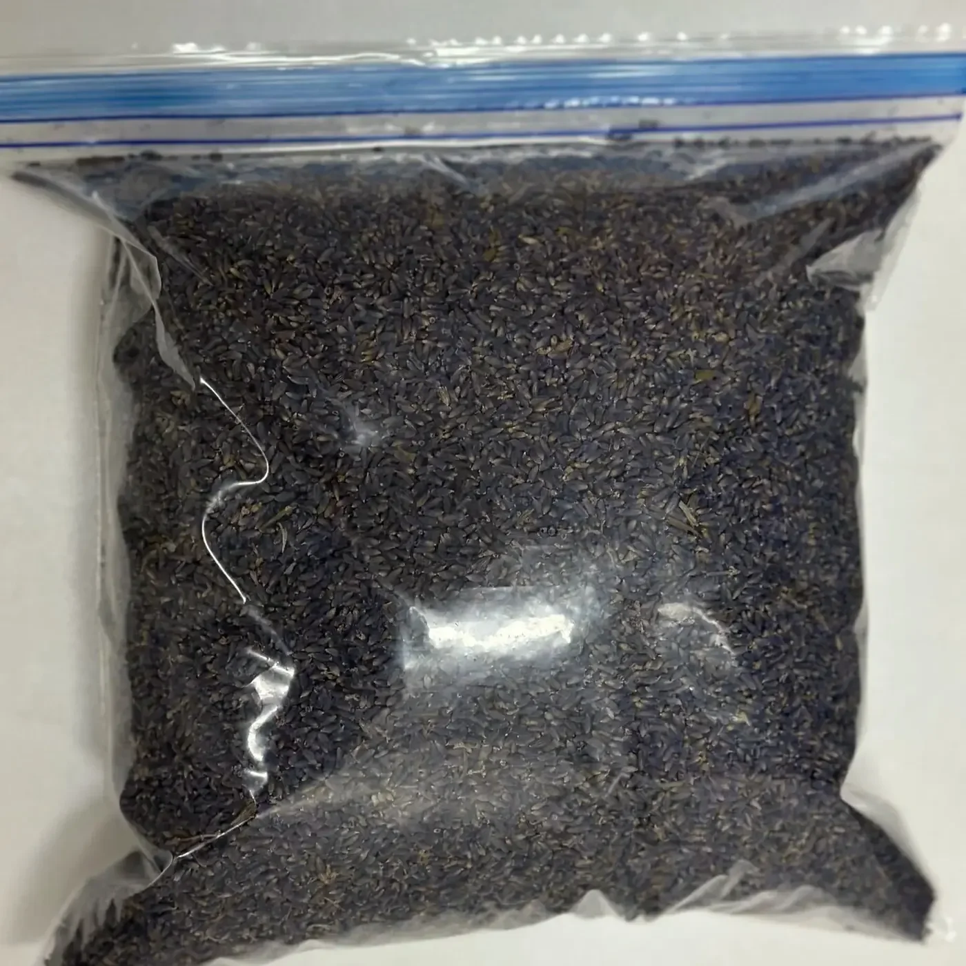 Clear resealable wholesale bag filled with dried lavender buds