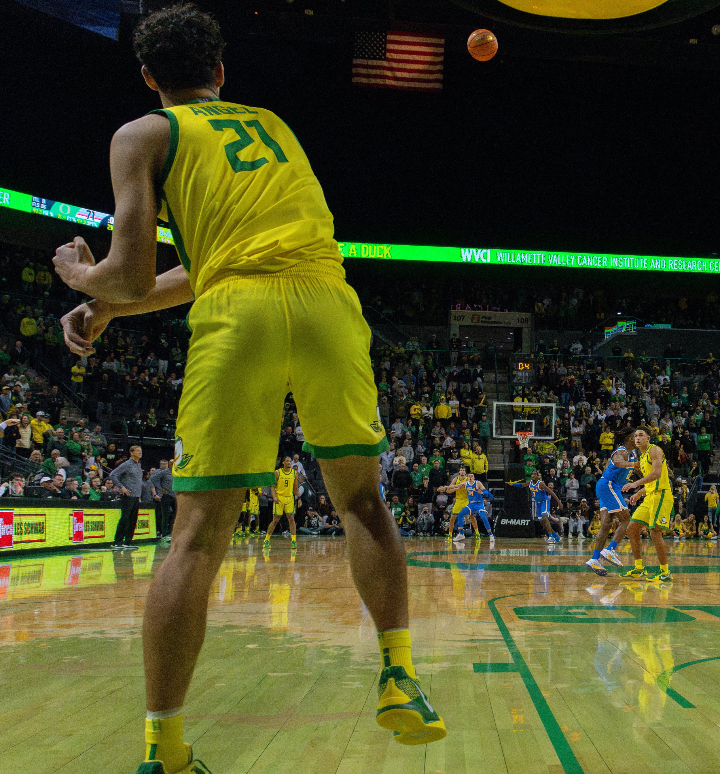 University of Oregon James Cooper, #12, makes a last ditch hail mary attempt in hopes of beating UCLA during the final second of the game. Photo by Emily Manciu