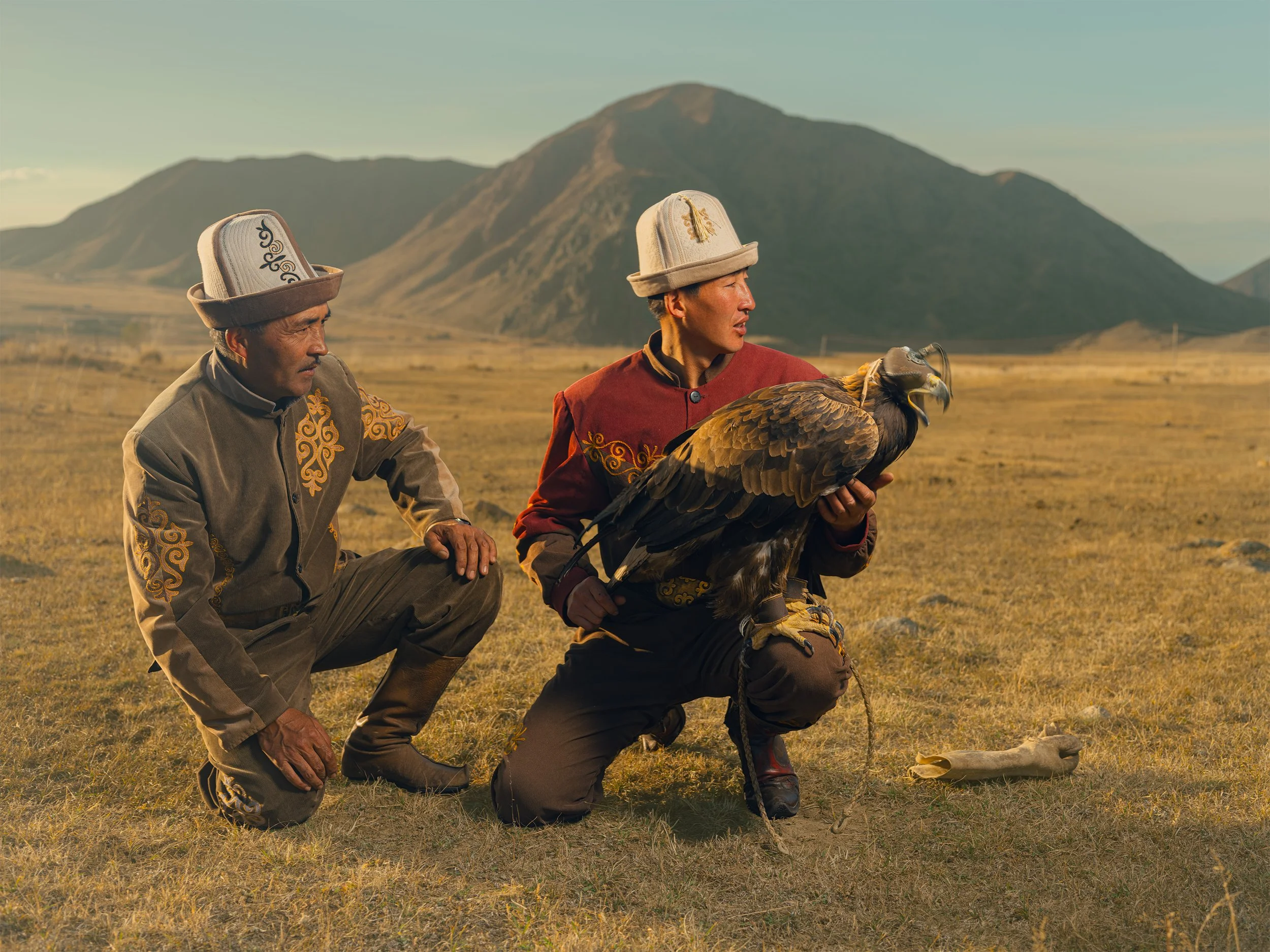 AdamDockerPhotography_Two_EagleHunters_Kyrgystan_GoldenEagle_Portrait.jpg