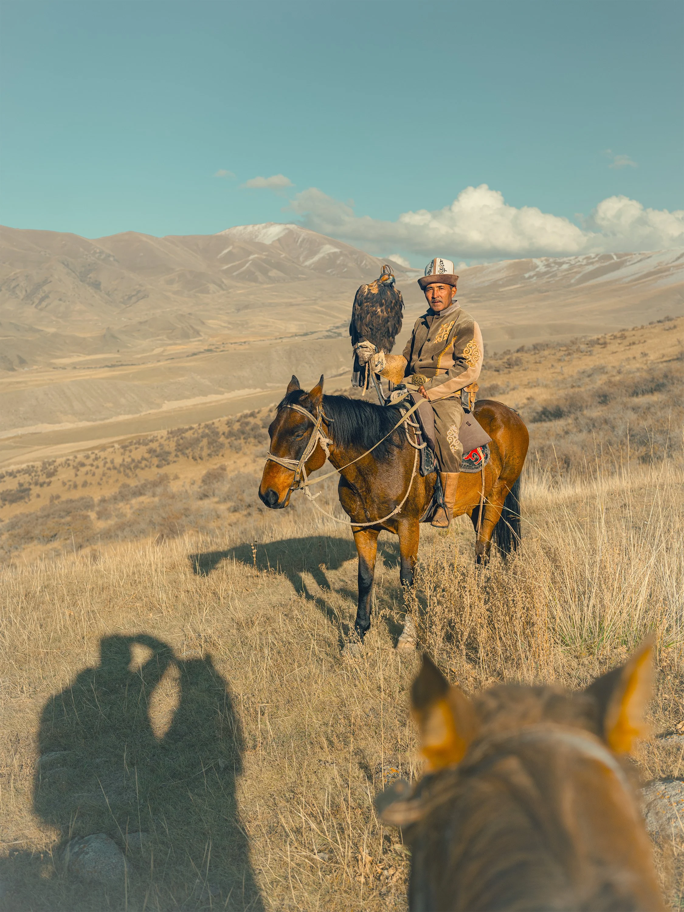 AdamDockerPhotography_EagleHunter_Kyrgystan_Aito_Birin_GoldenEagle_OnAHorse_Portrait.jpg