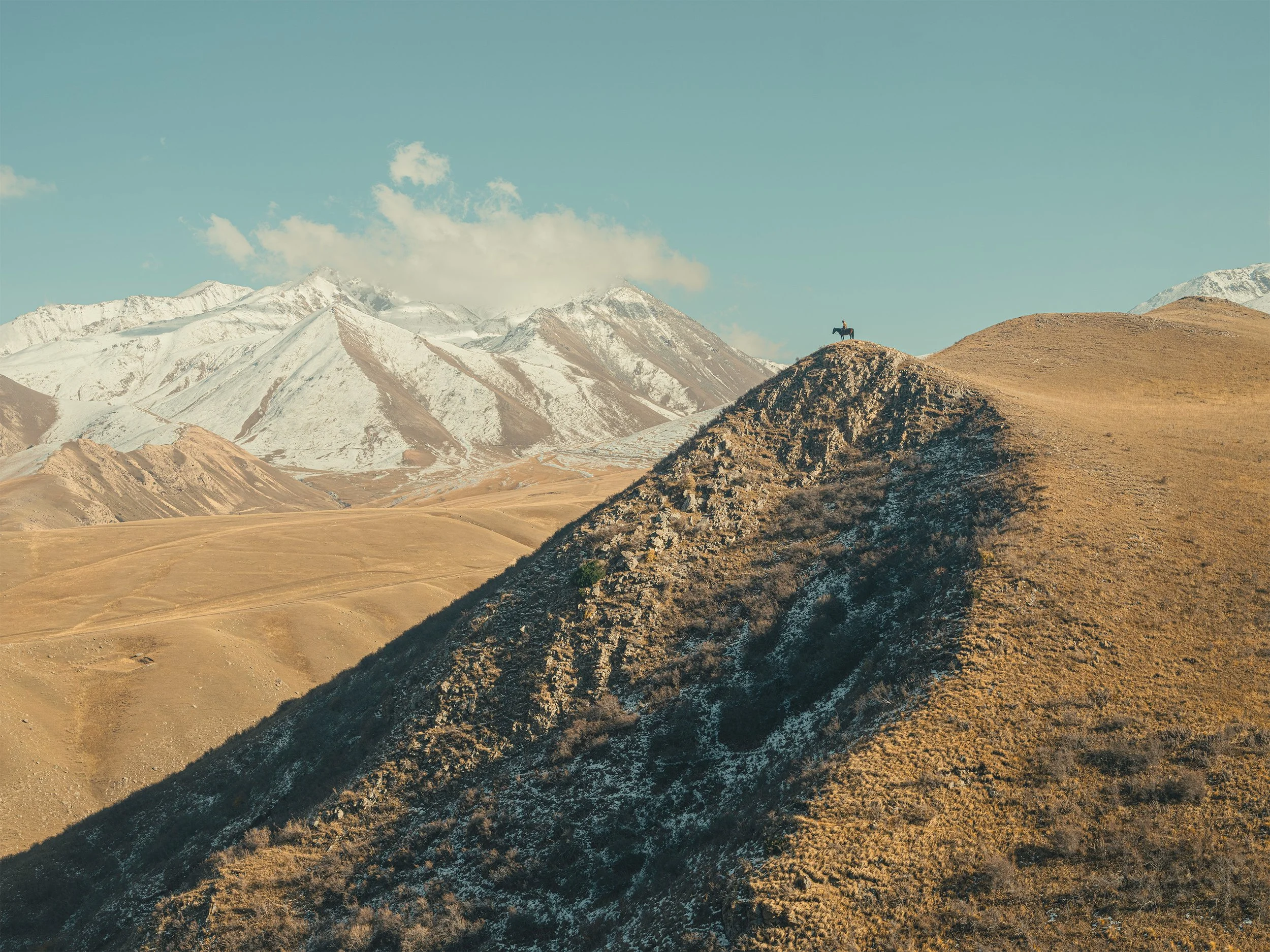 AdamDockerPhotography_EagleHunter_Kyrgystan_Aito_Birin_GoldenEagle_Landscape.jpg