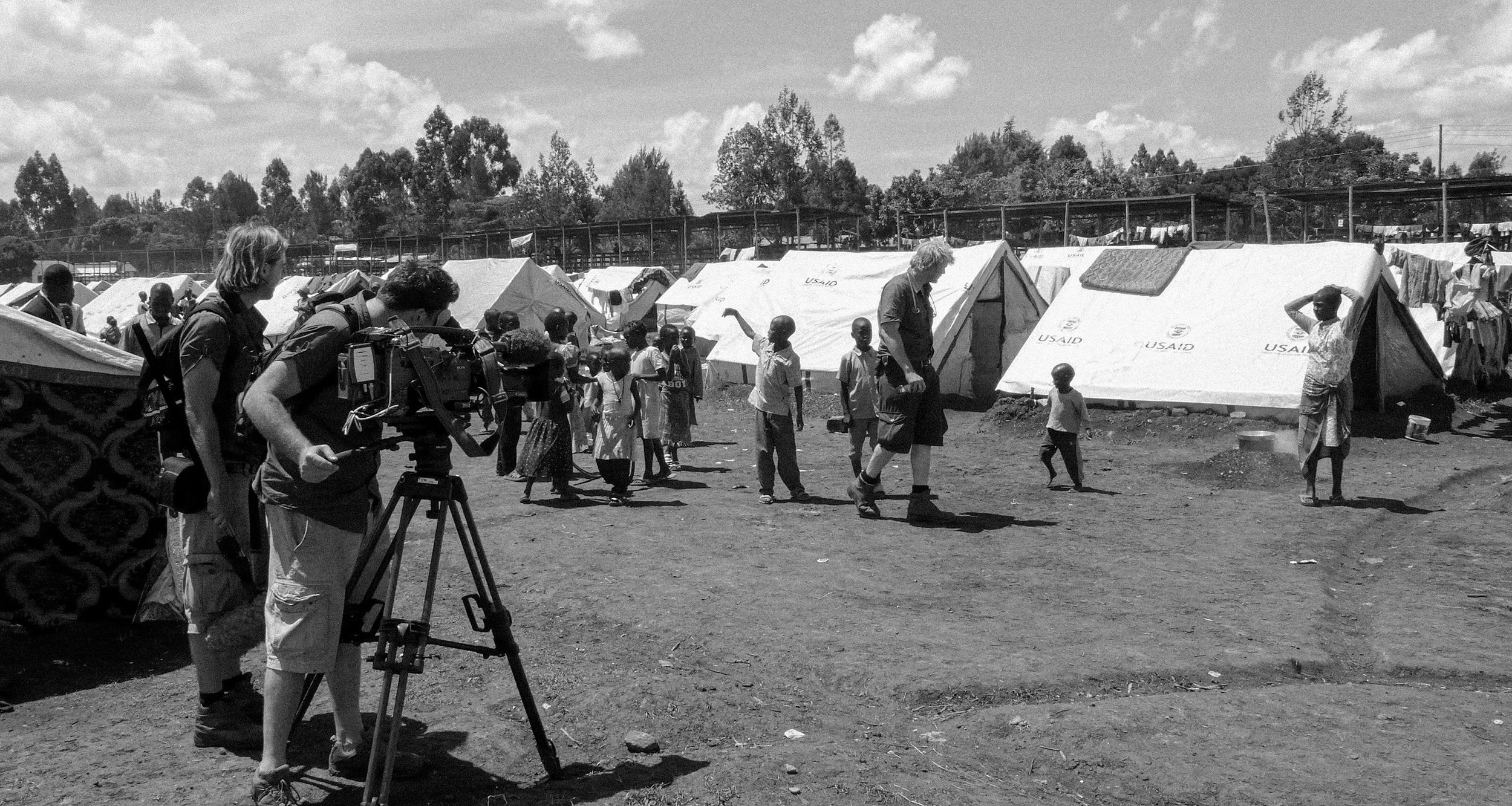 Documentary crew filming veterinary surgeon Luke Gamble's humanitarian work in a refugee camp in Kenya's Rift Valley, 2009