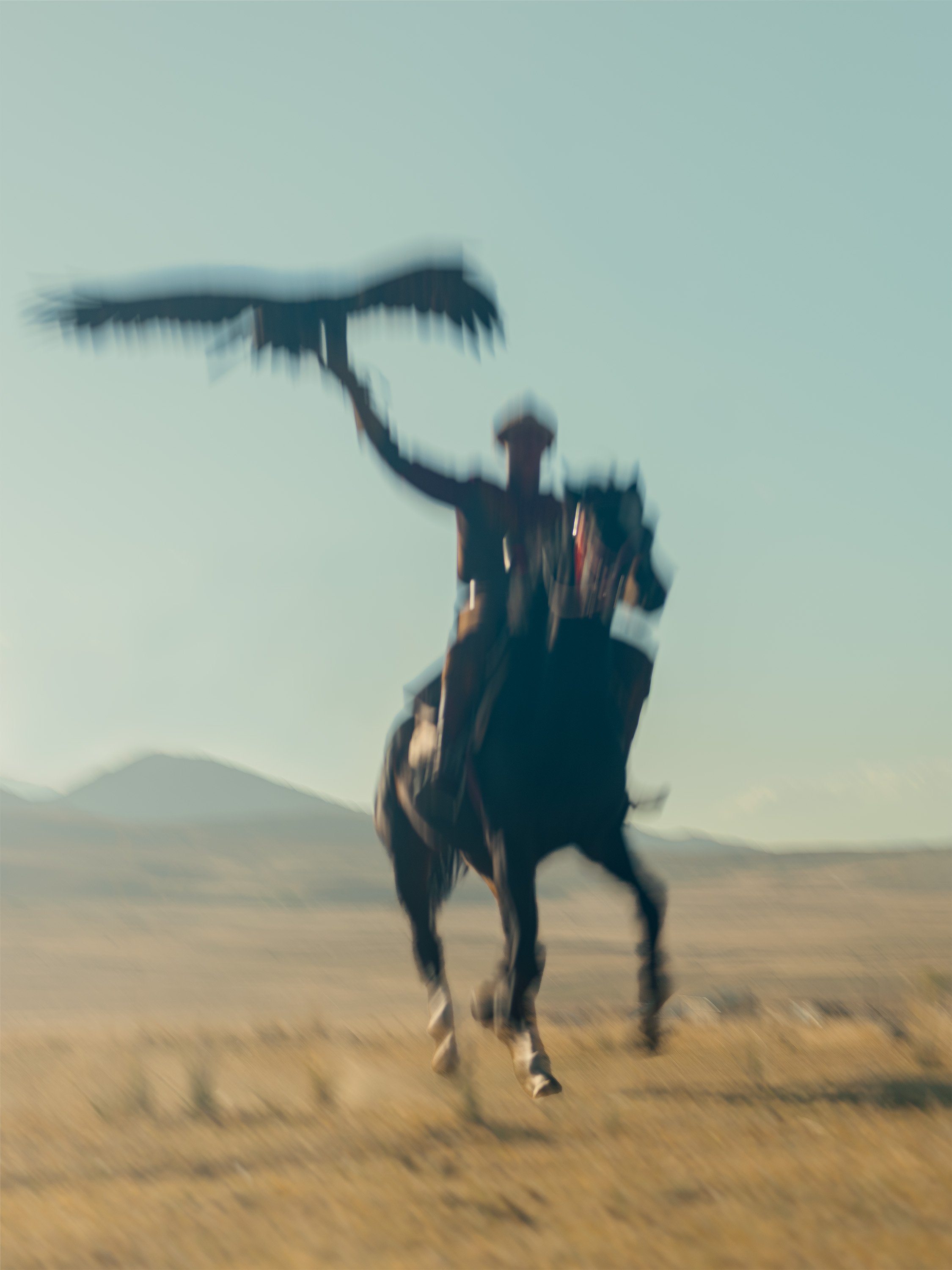 AdamDockerPhotography_EagleHunters_Kyrgystan_GoldenEagle_Silhouette_RidingHorse.jpg
