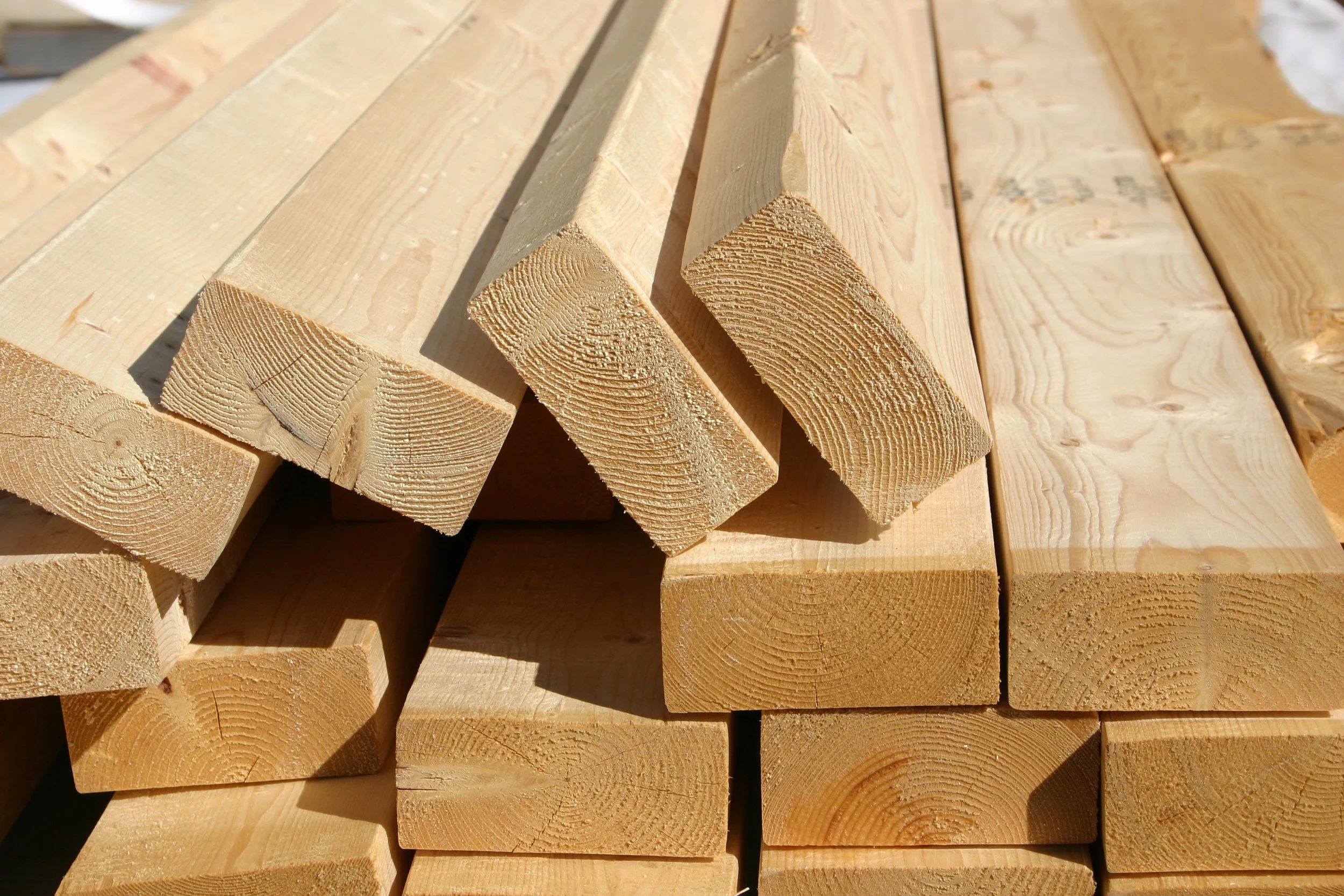 Stacked dimensional lumber and plywood