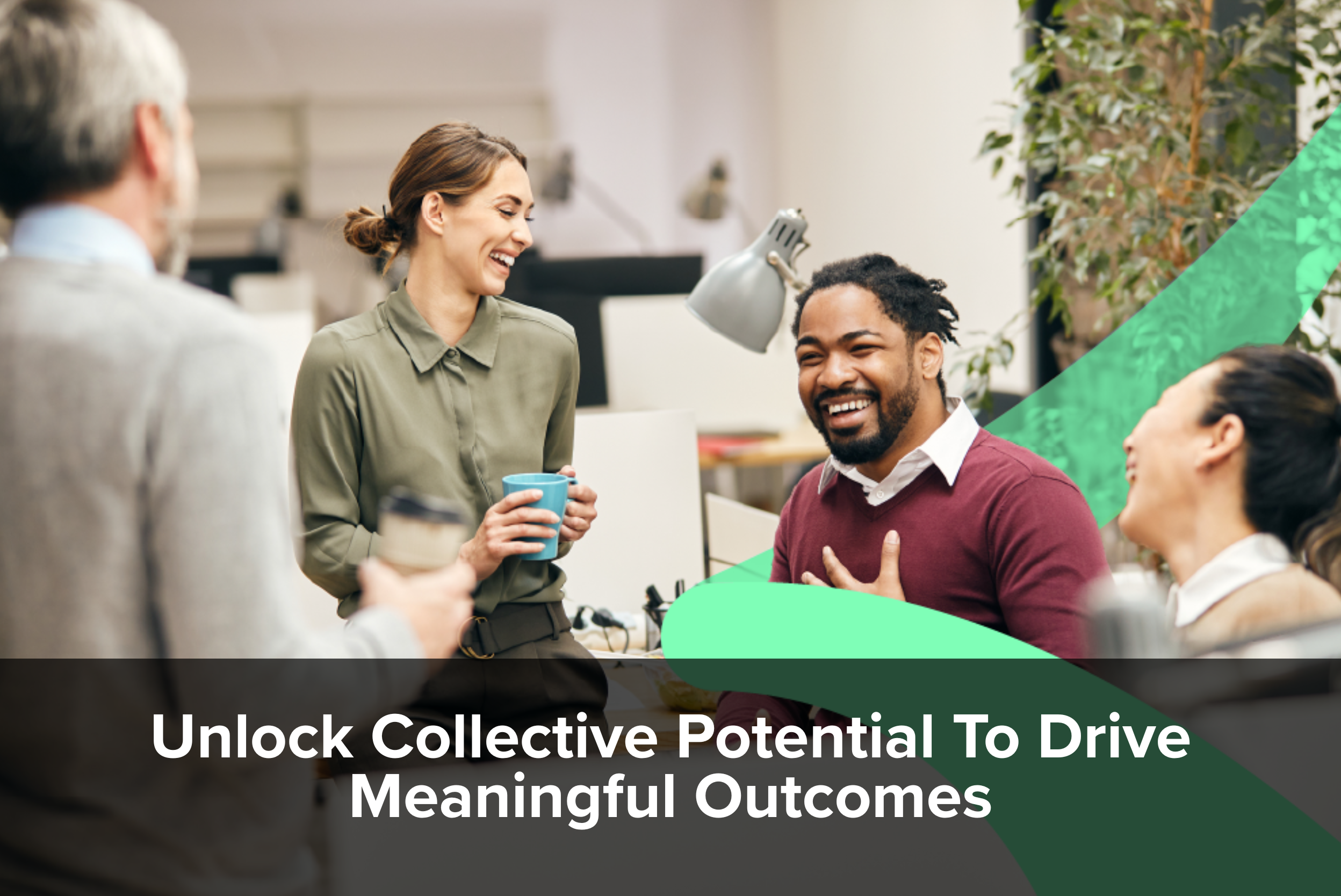 Co-workers in an office laugh and collaborate. They took an online course on meaningful outcomes.