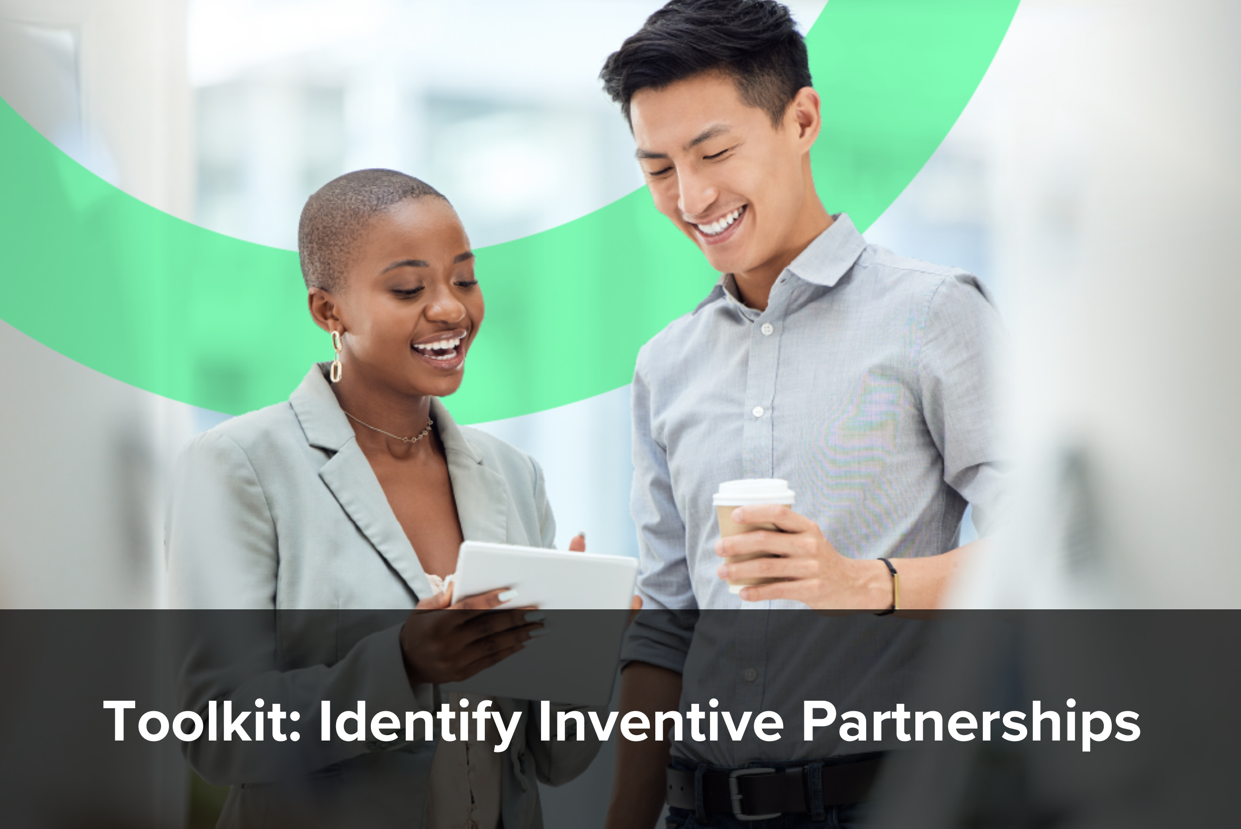 A woman and a man speak to each other over some paper and coffee. They are using a toolkit to identify inventive partnerships