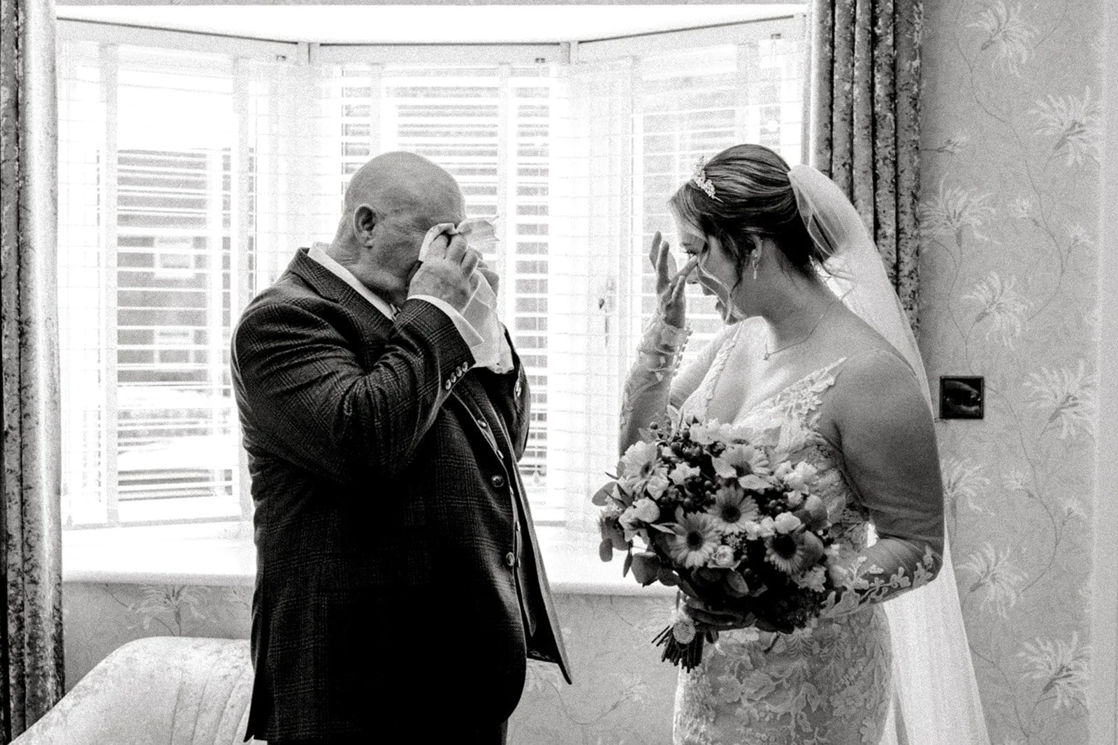 emotional first look with bride and father of bride captured by laura jane photography