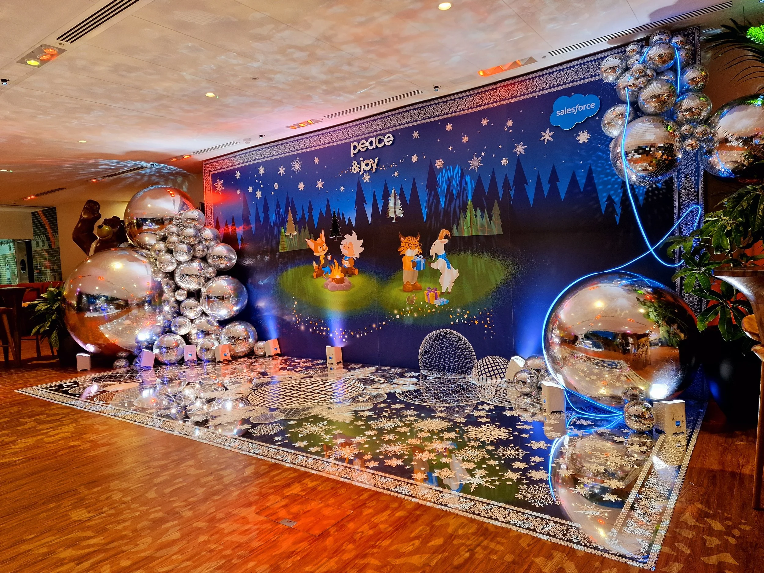 Themed christmas decor, Salesforce, mirror balls, luxury decor, custom printed floor, custom printed backdrop