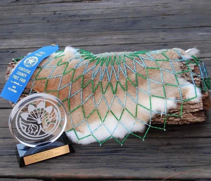 grn and blu collar and award.jpg