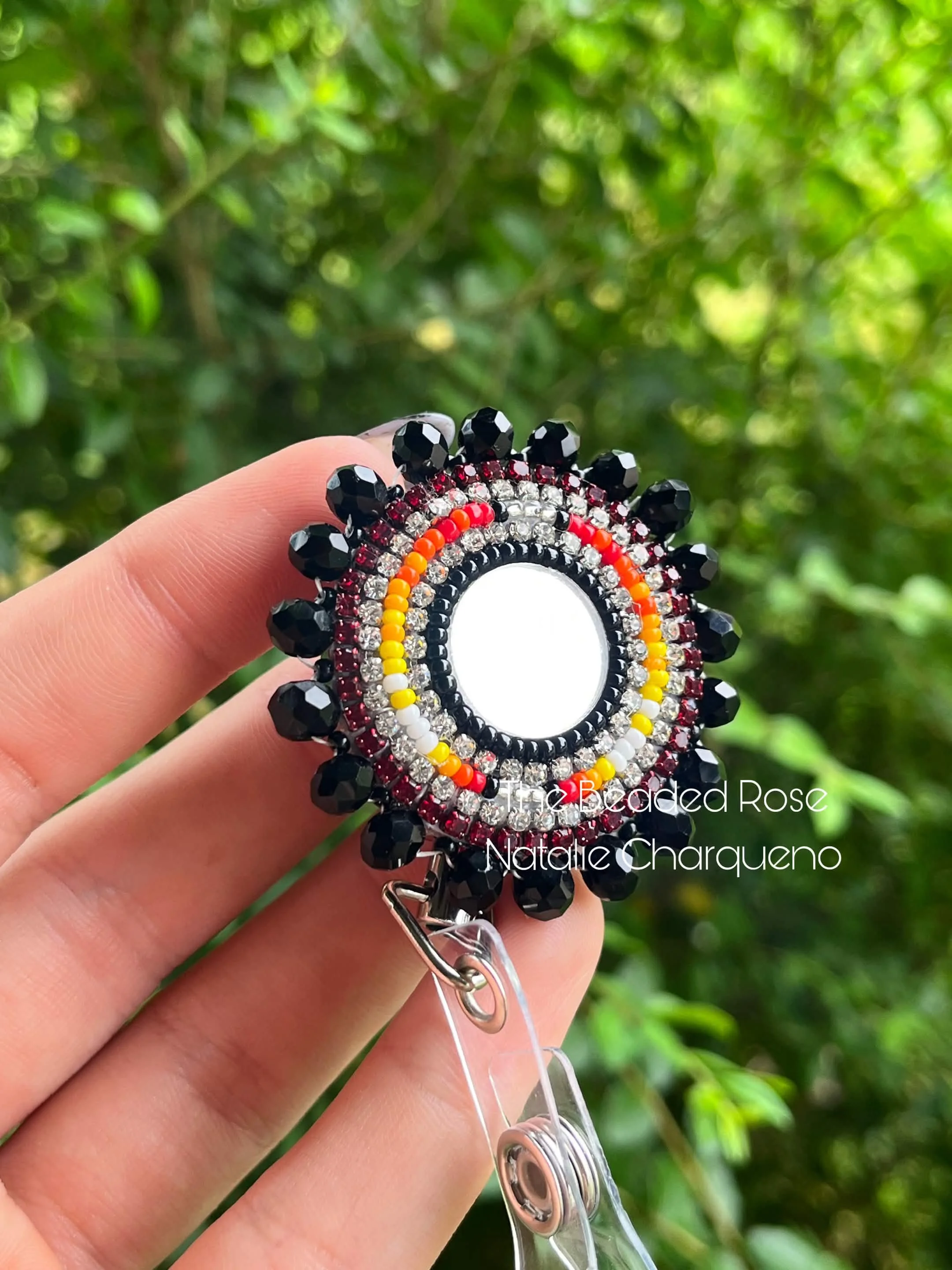 red black and fire badge reel.jpg
