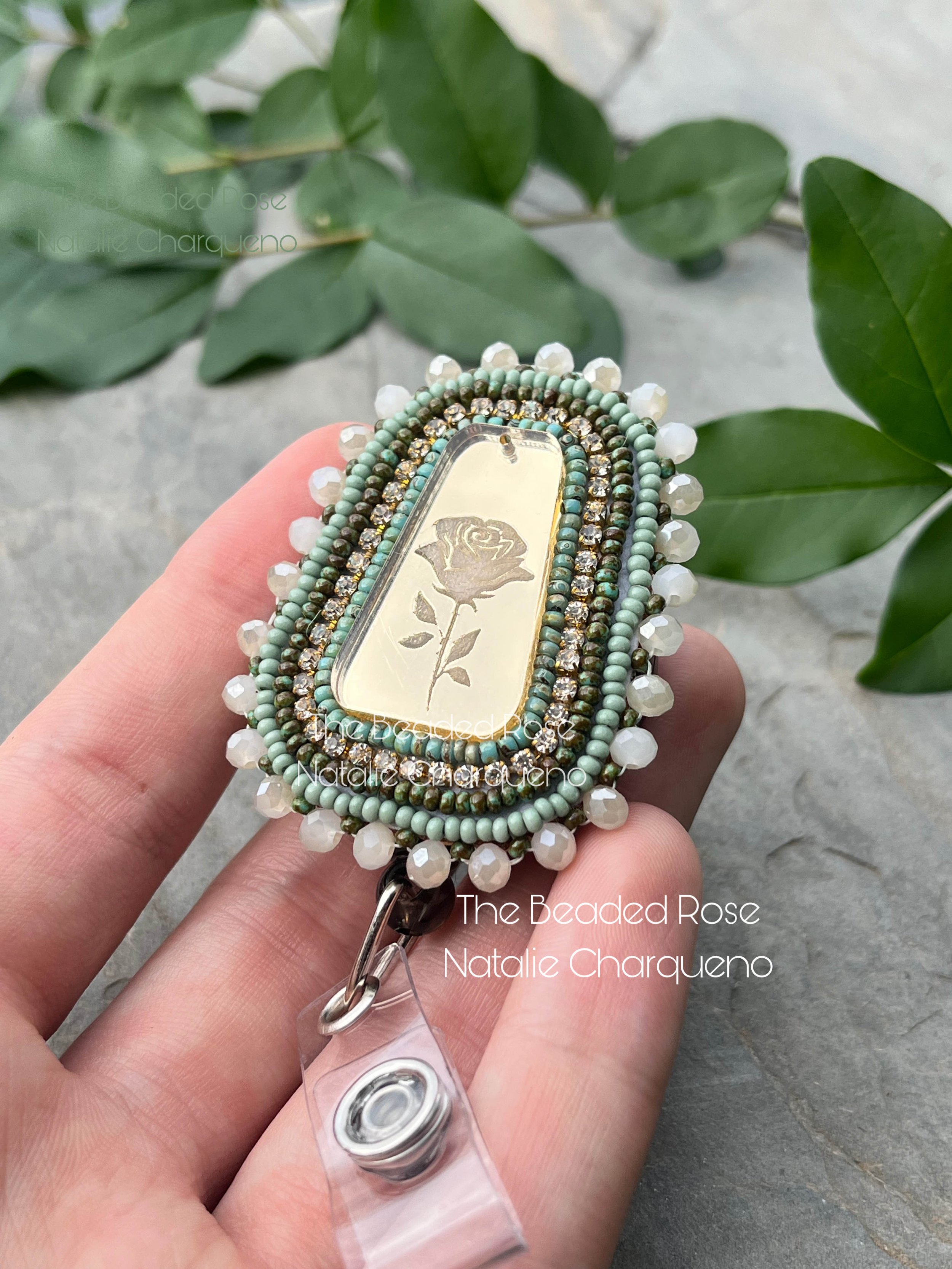 rose and green badge reel.jpg