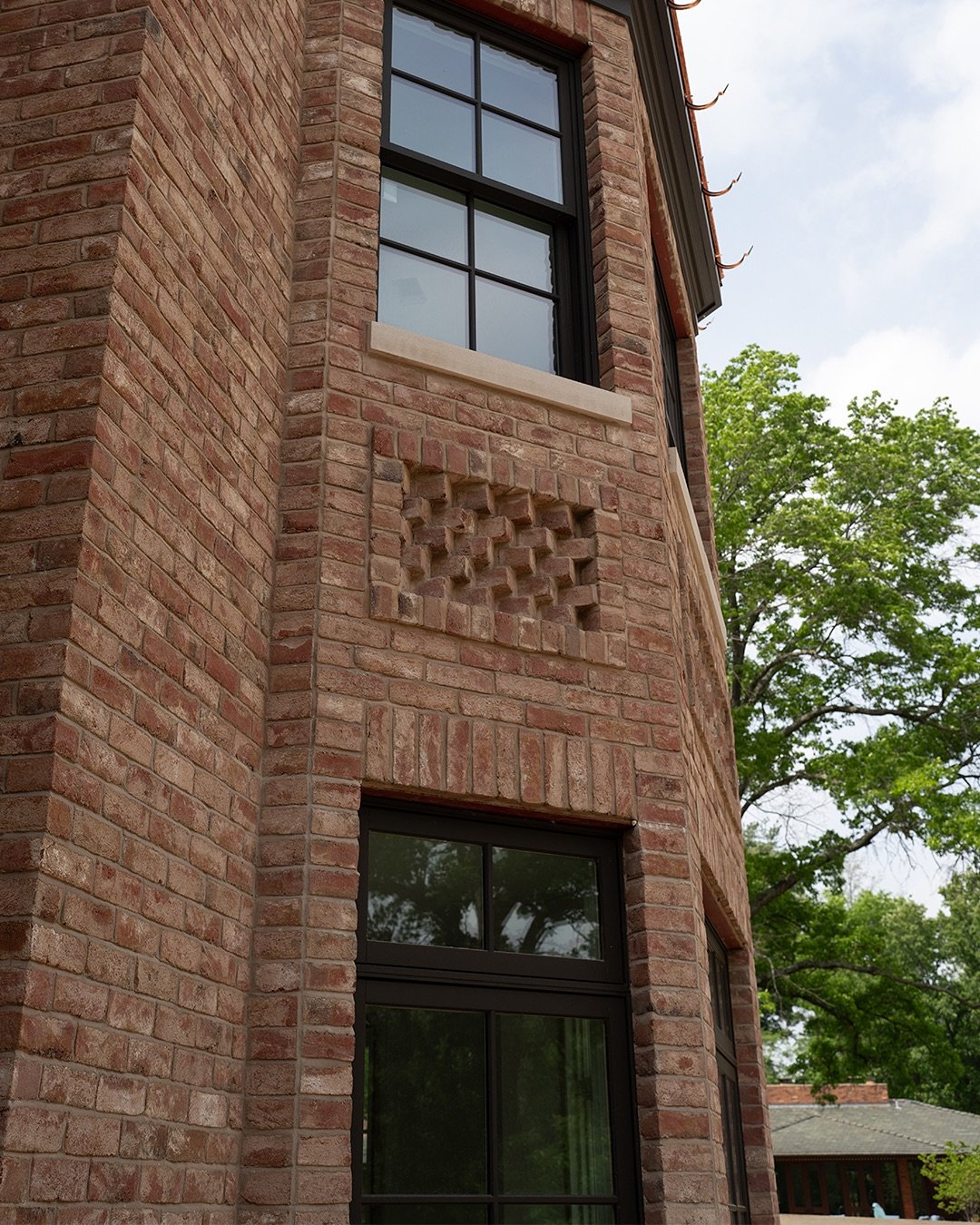 Whether it&rsquo;s a custom brick shape or a creative layout, we always love seeing special details within brick installations. These handmade bricks feature inlays with a rippling fa&ccedil;ade pattern and a stunning herringbone application. 

Which